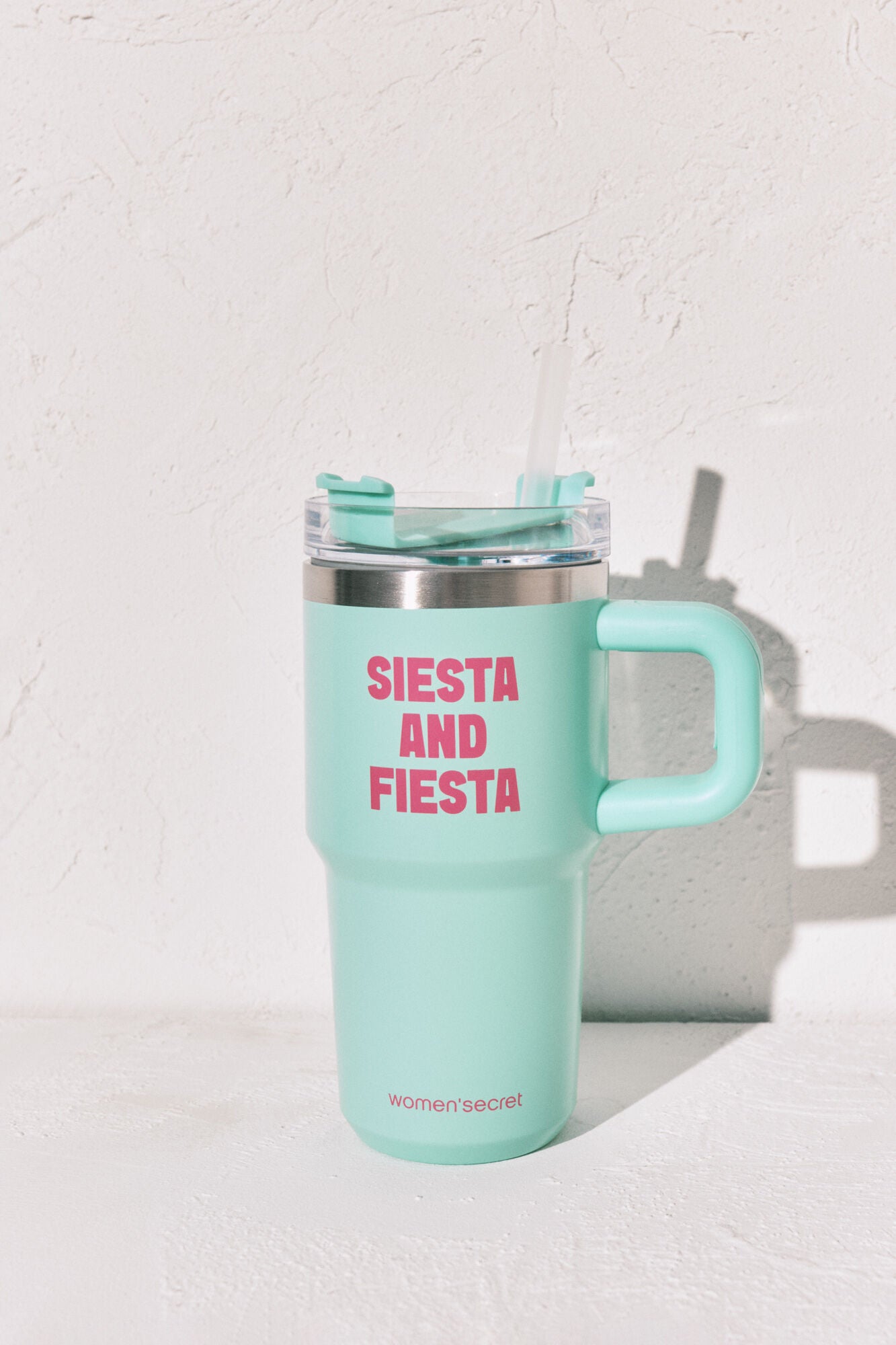 Stainless steel bottle with blue handle