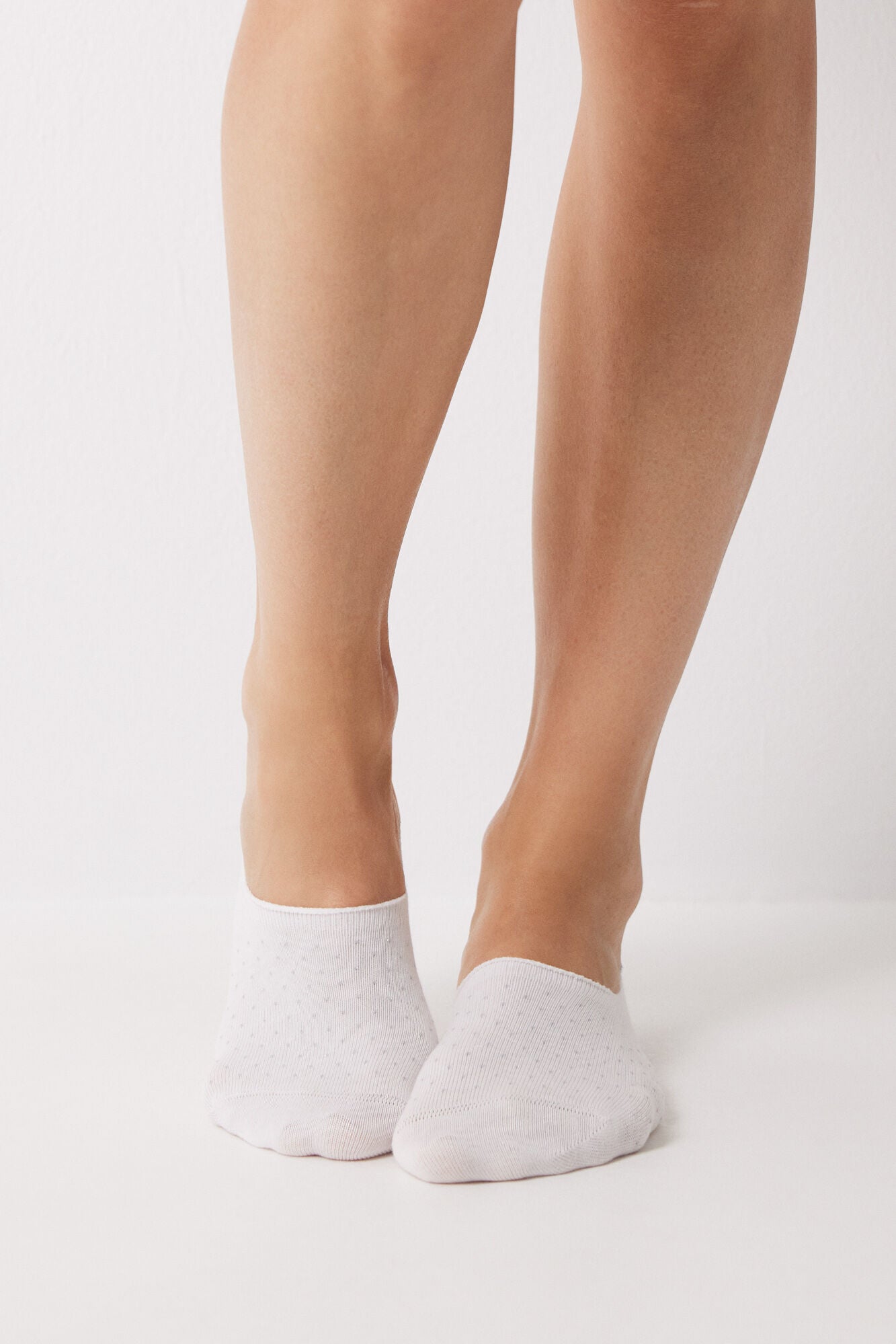 White invisible socks with arrows