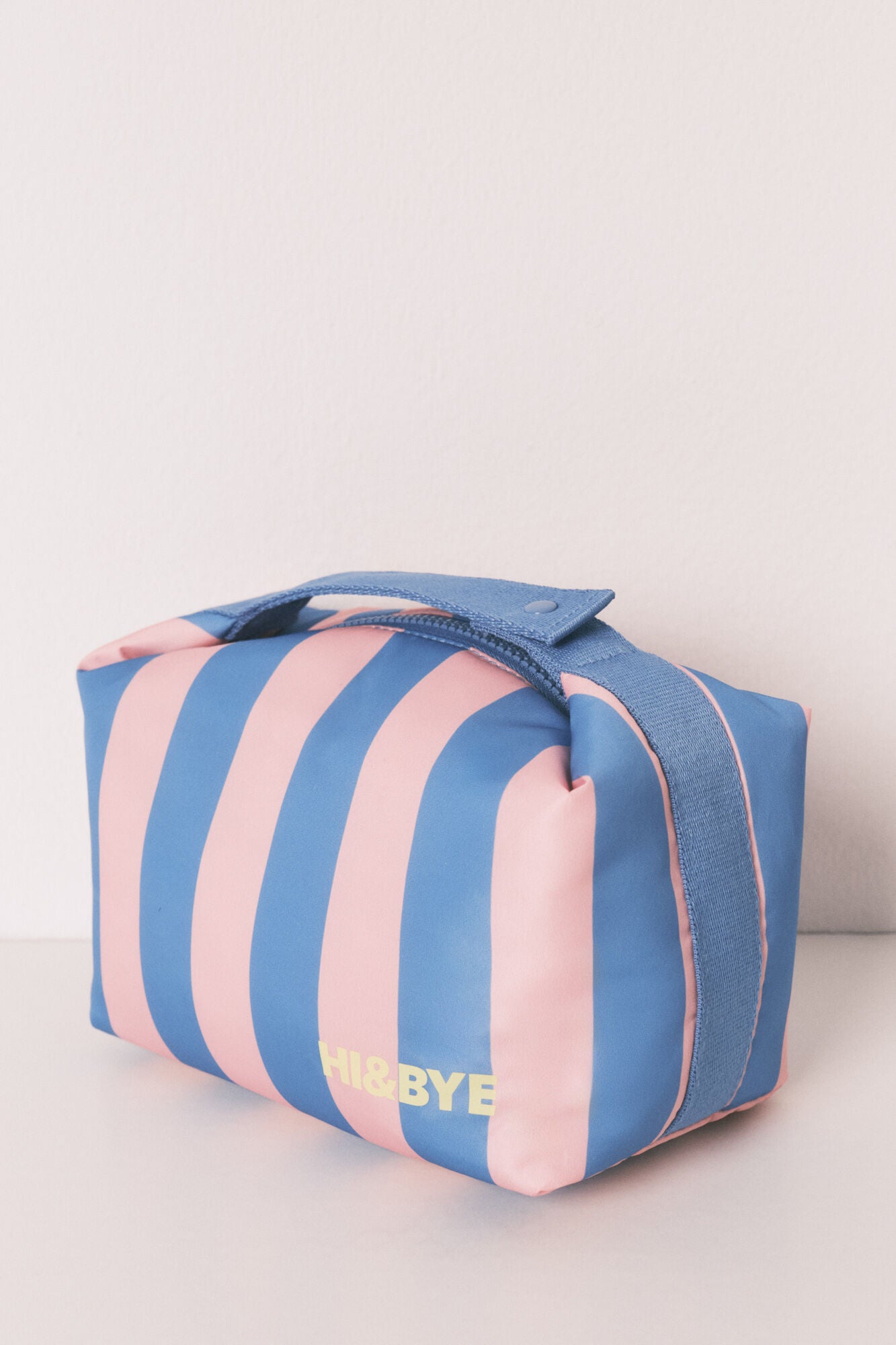 Medium-sized toiletry bag with blue striped print