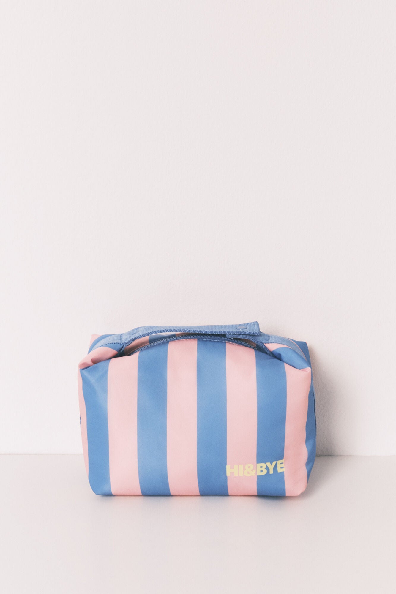 Medium-sized toiletry bag with blue striped print