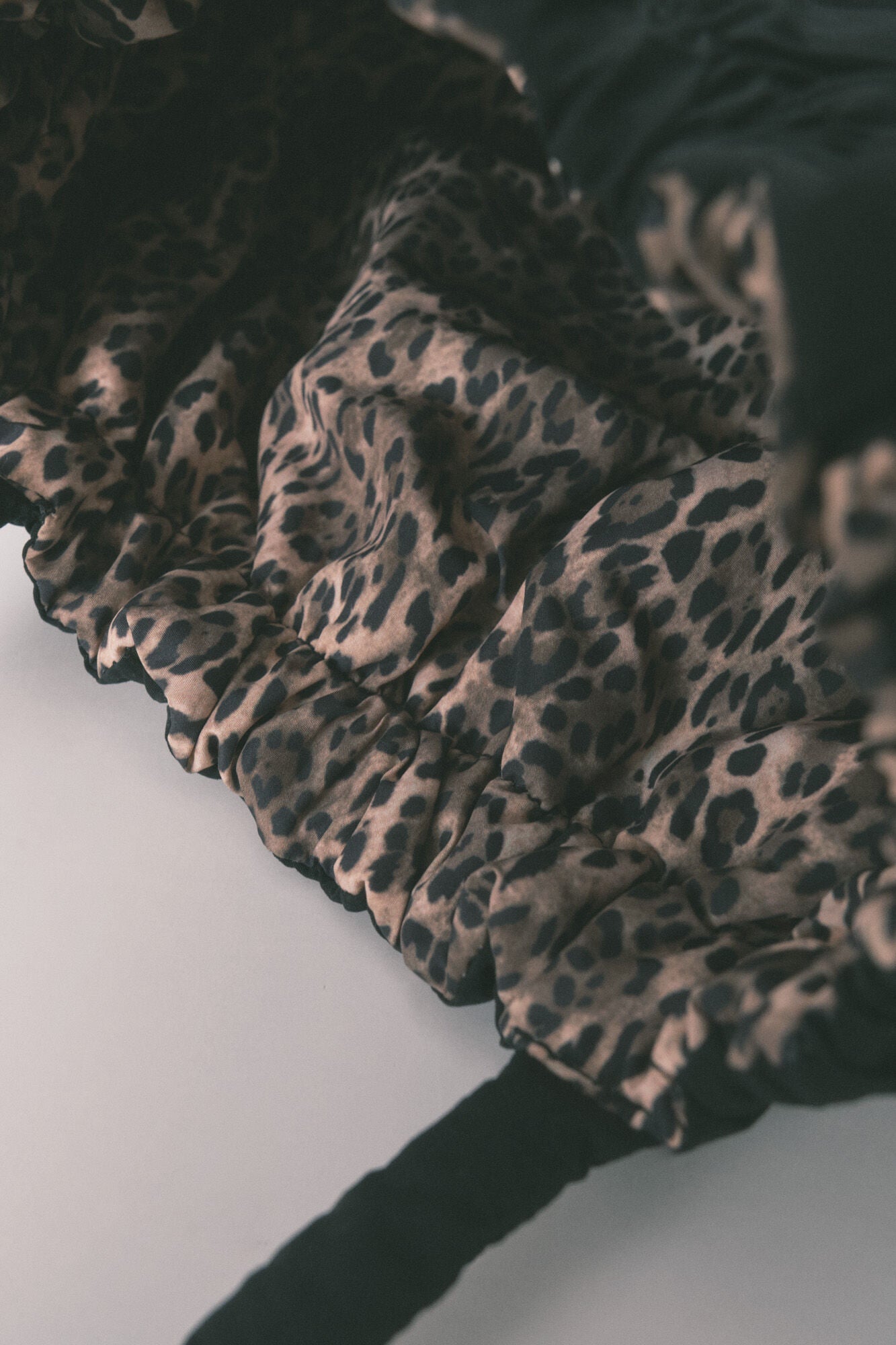 Animal print reversible nylon bag