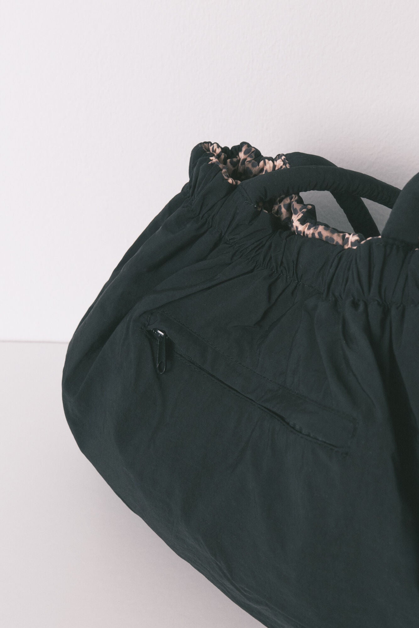 Animal print reversible nylon bag