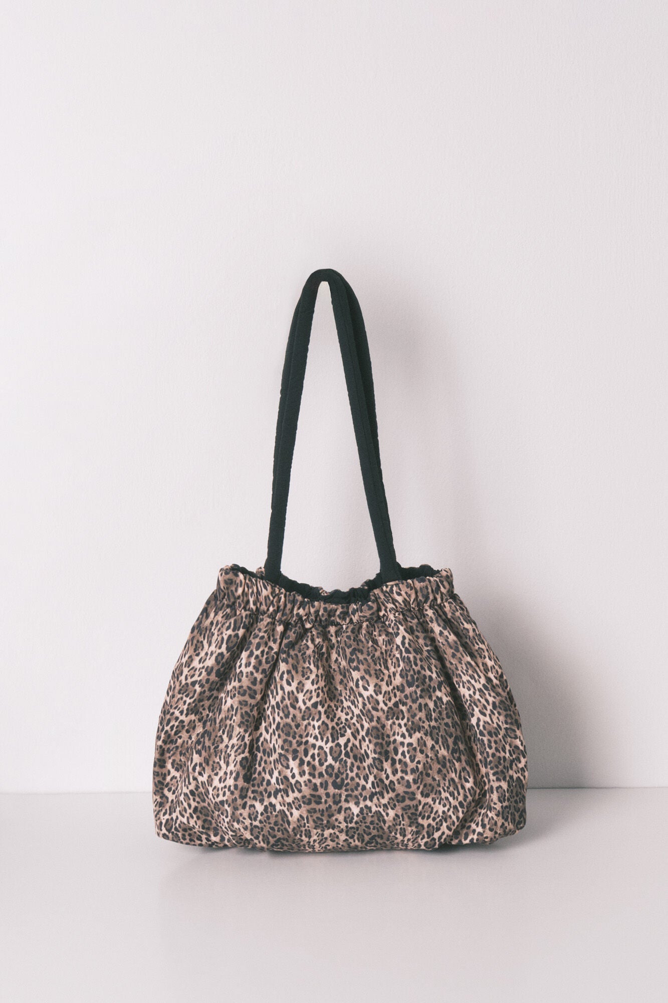 Animal print reversible nylon bag