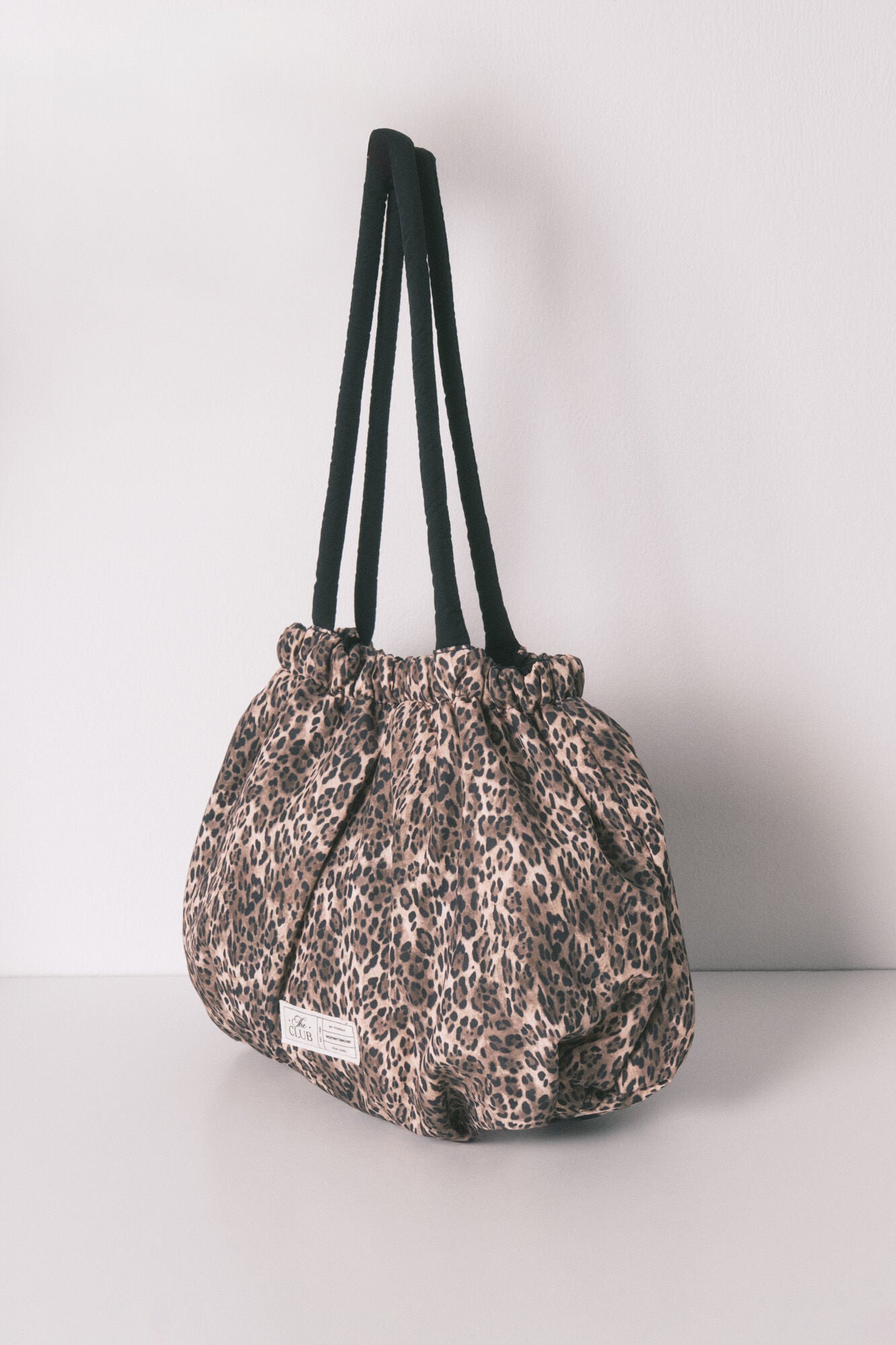 Animal print reversible nylon bag