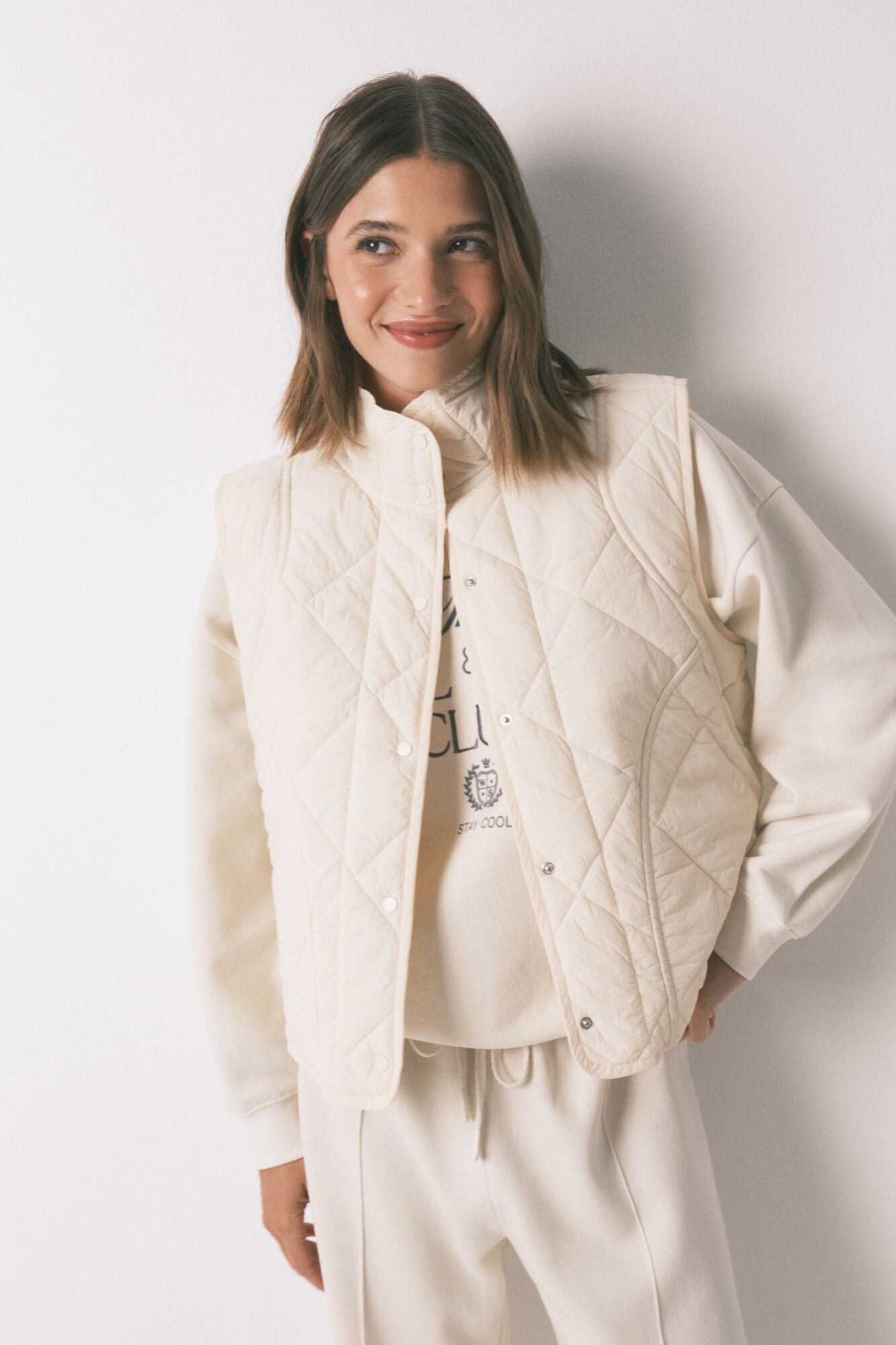 White padded vest