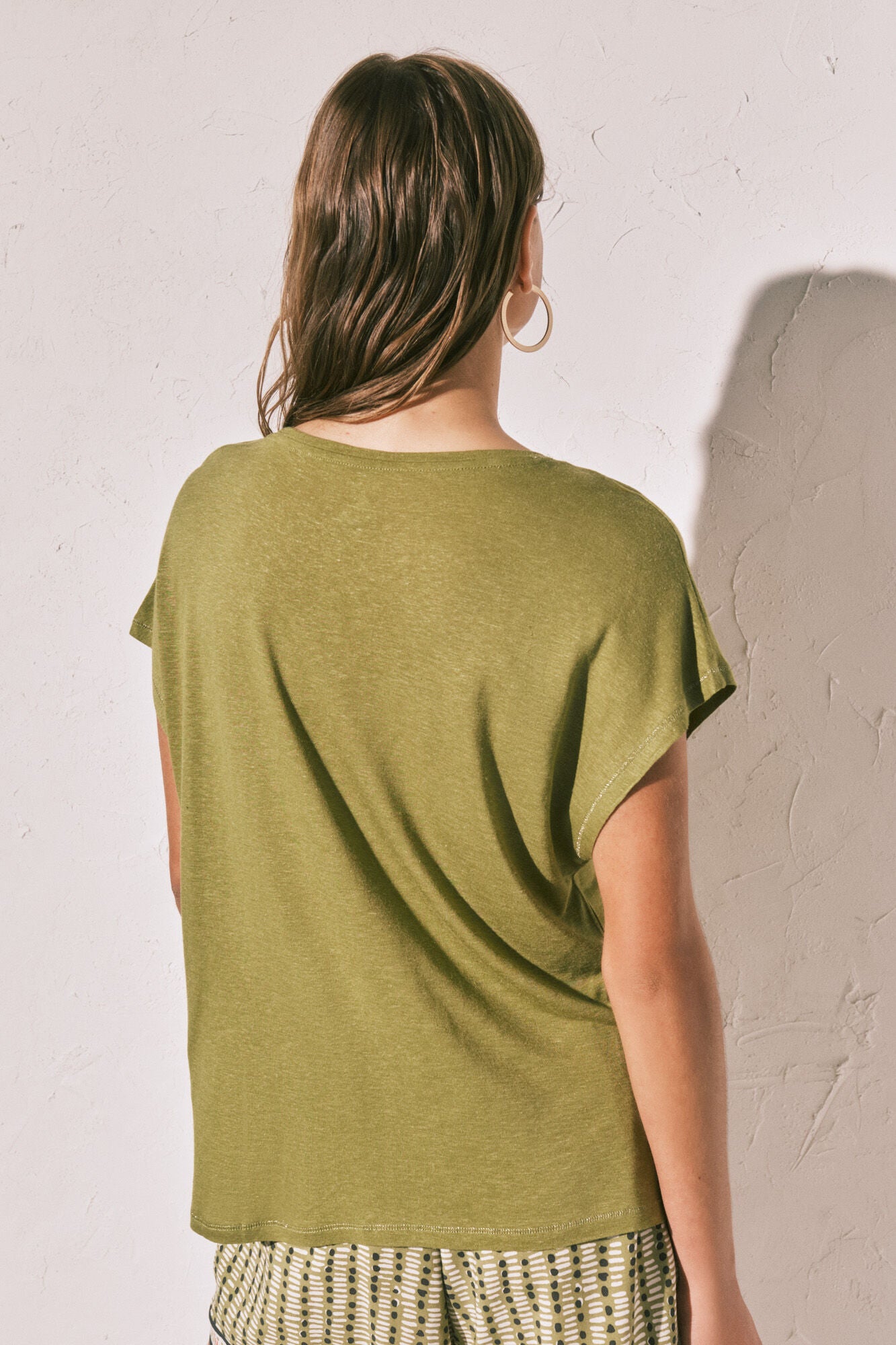 Green short-sleeved t-shirt