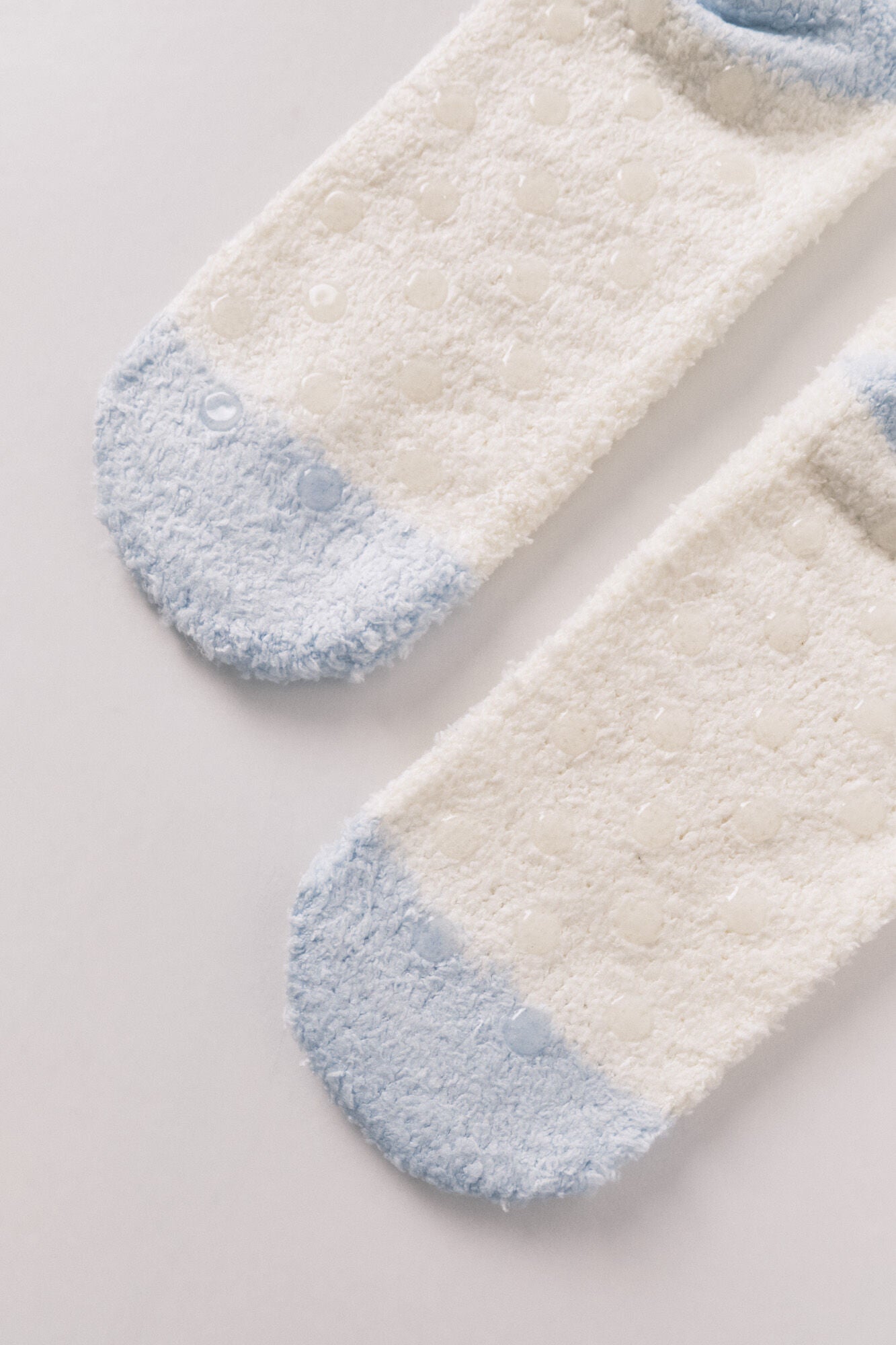 Long fur socks with snowman print.