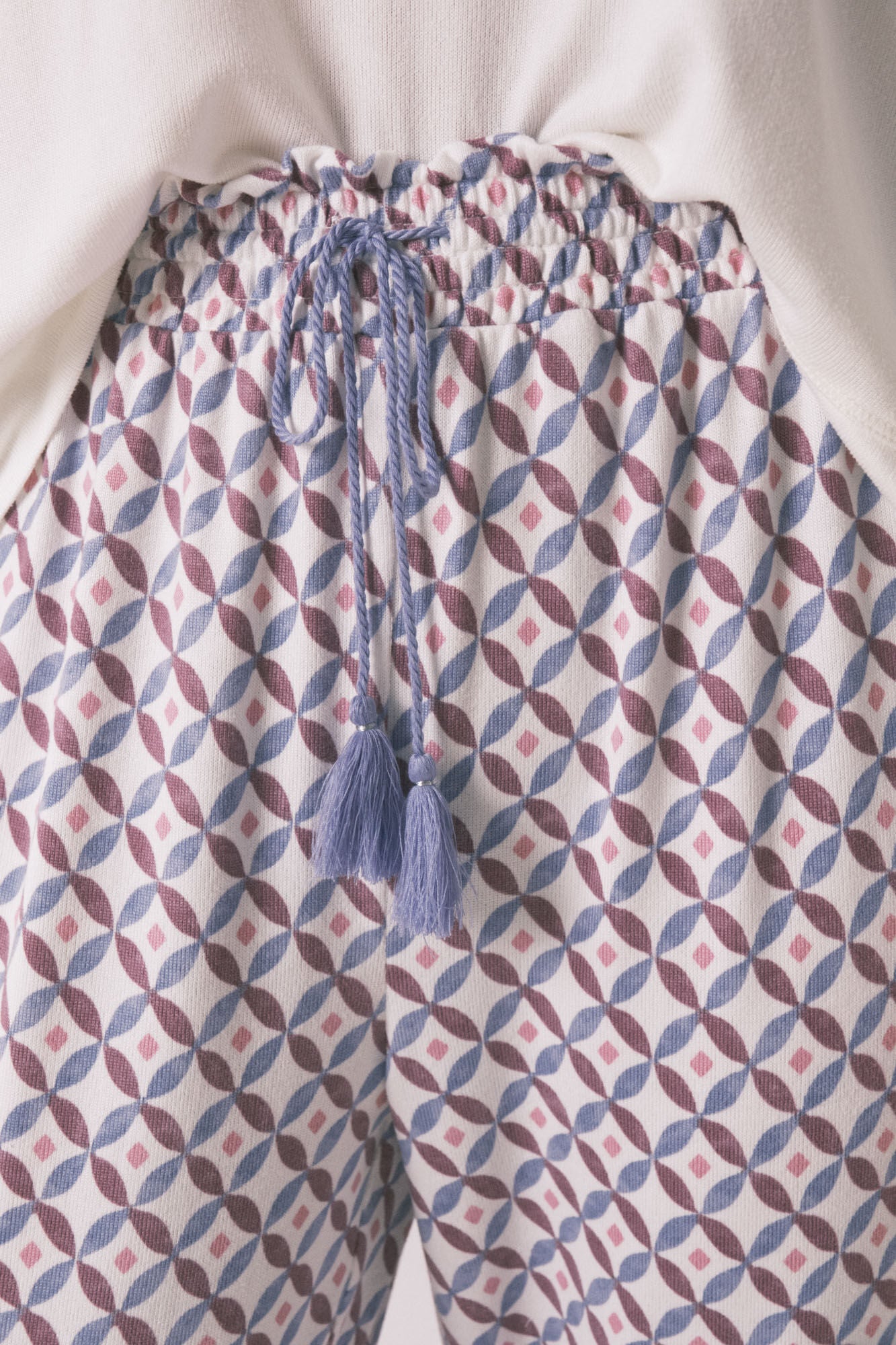 Long, wide-legged soft-knit blue trousers