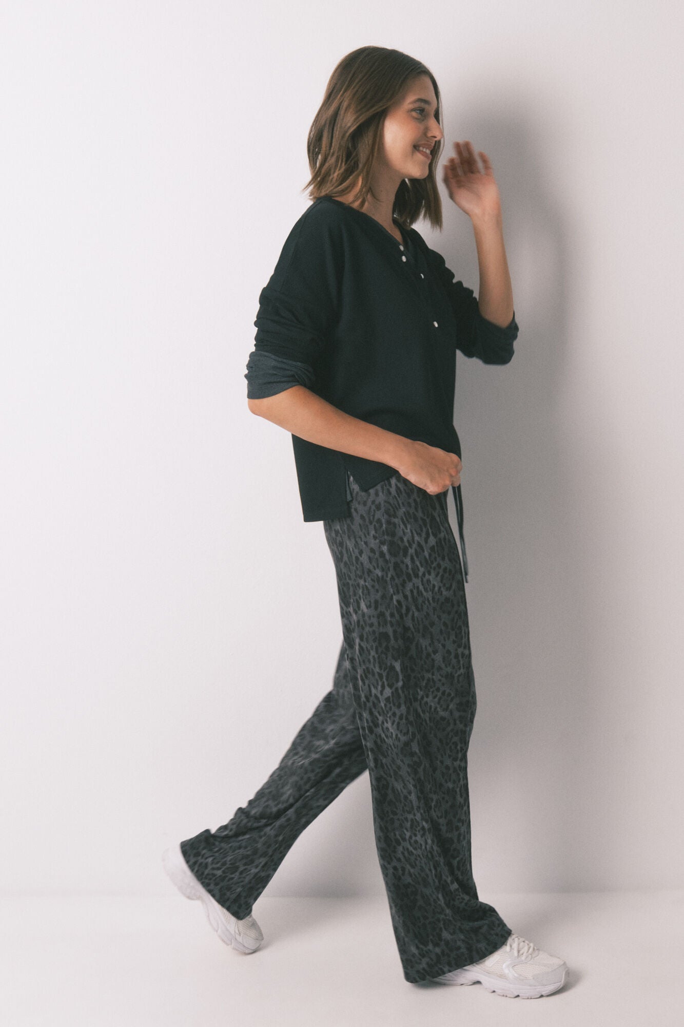 Grey animal print trousers