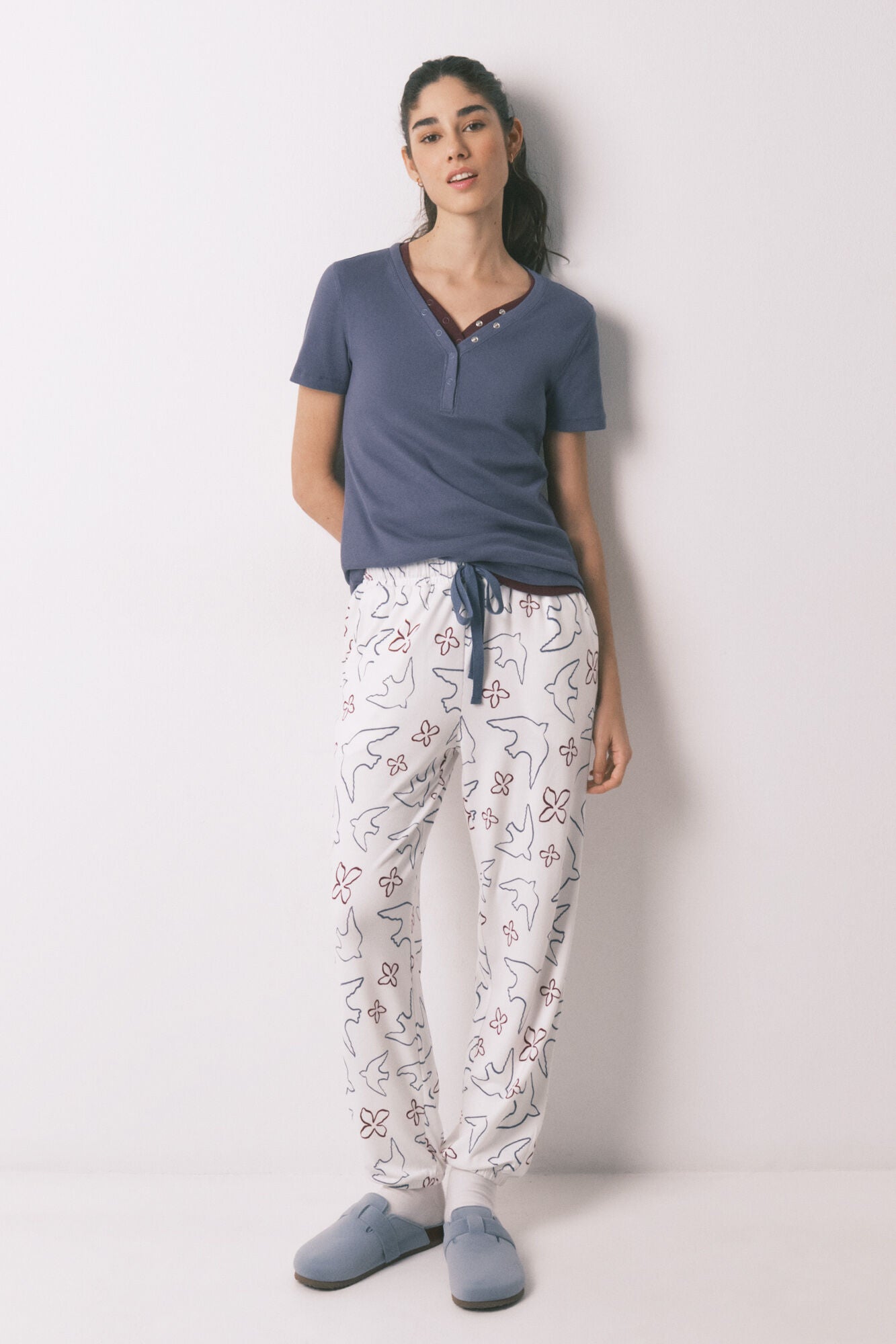 White long bird print trousers