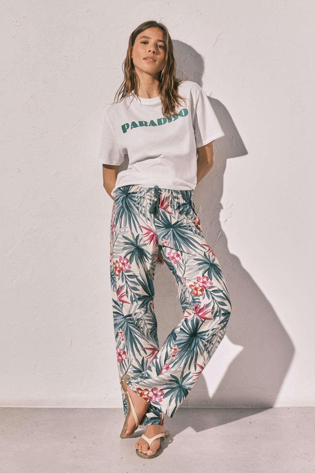 Long green patterned trousers