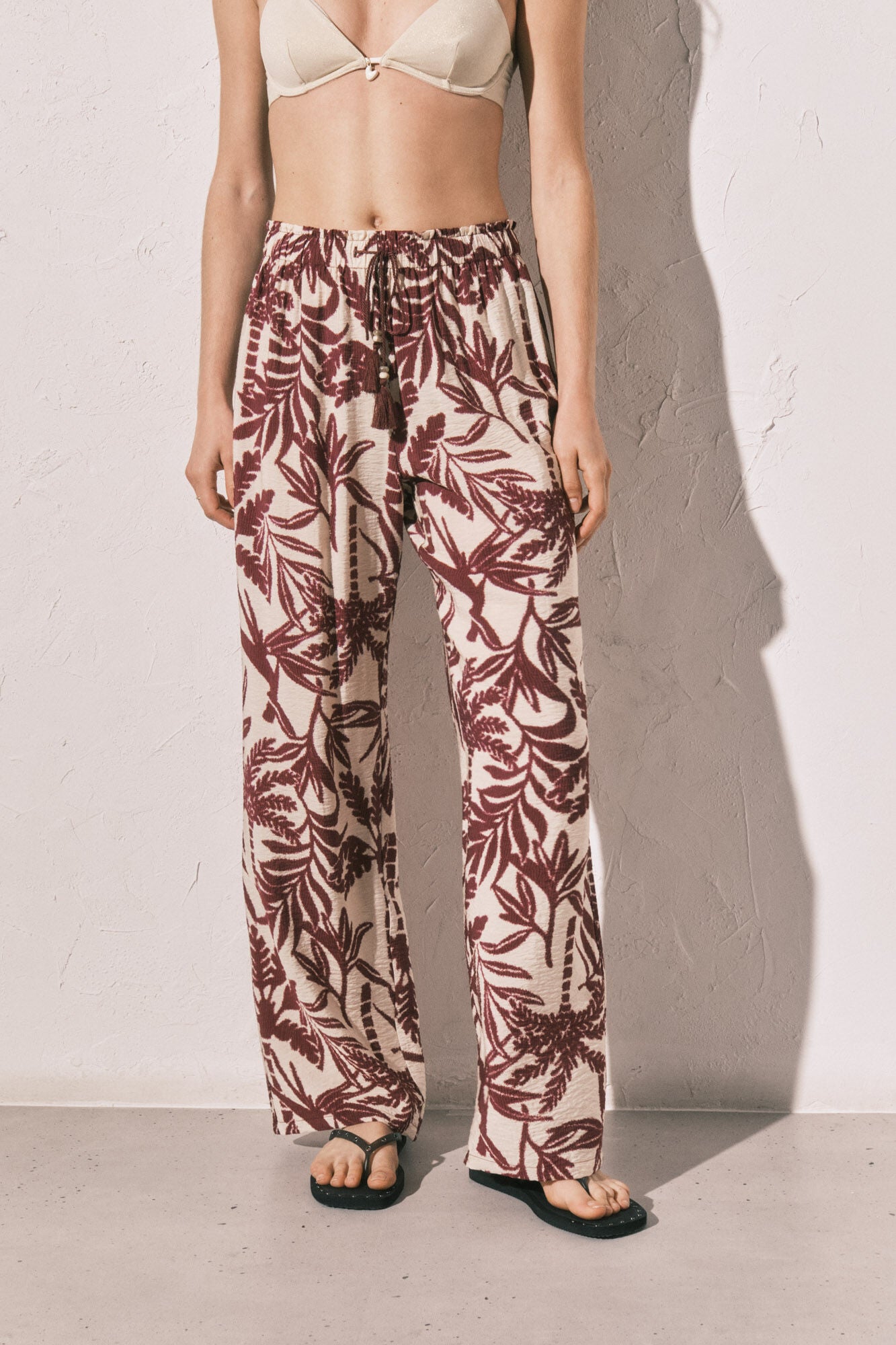 Burgundy patterned long trousers