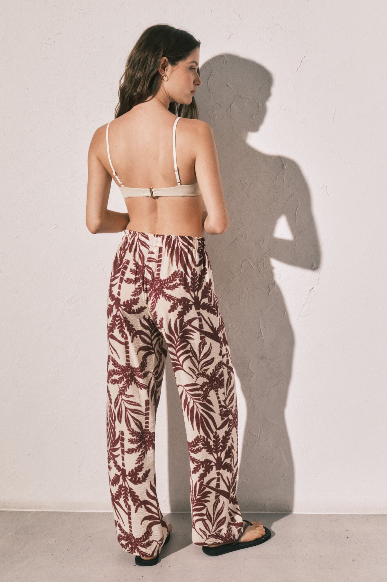 Burgundy patterned long trousers