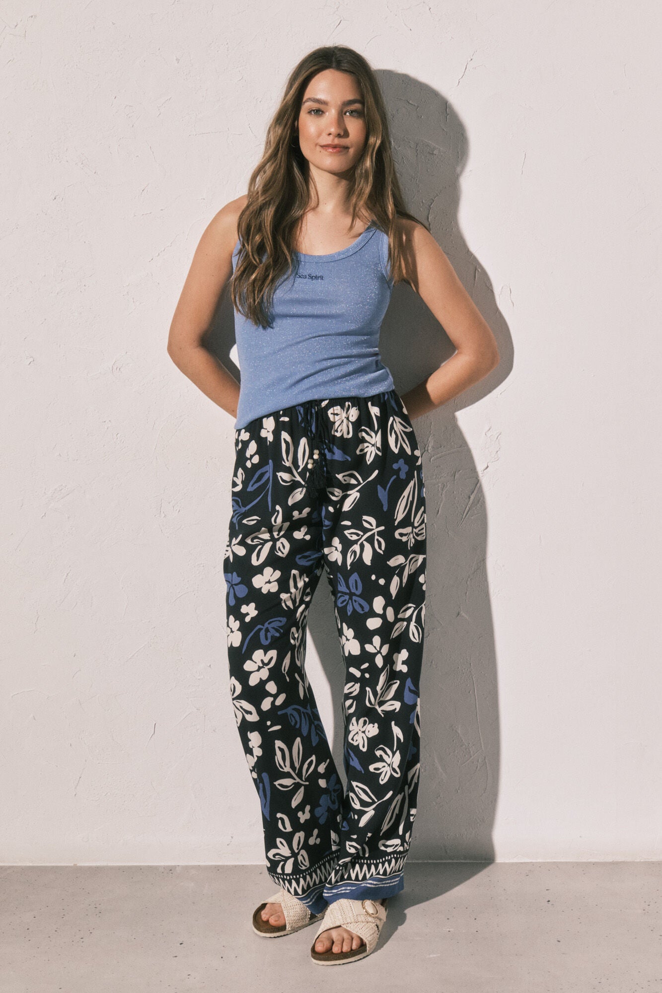 Blue floral print long trousers
