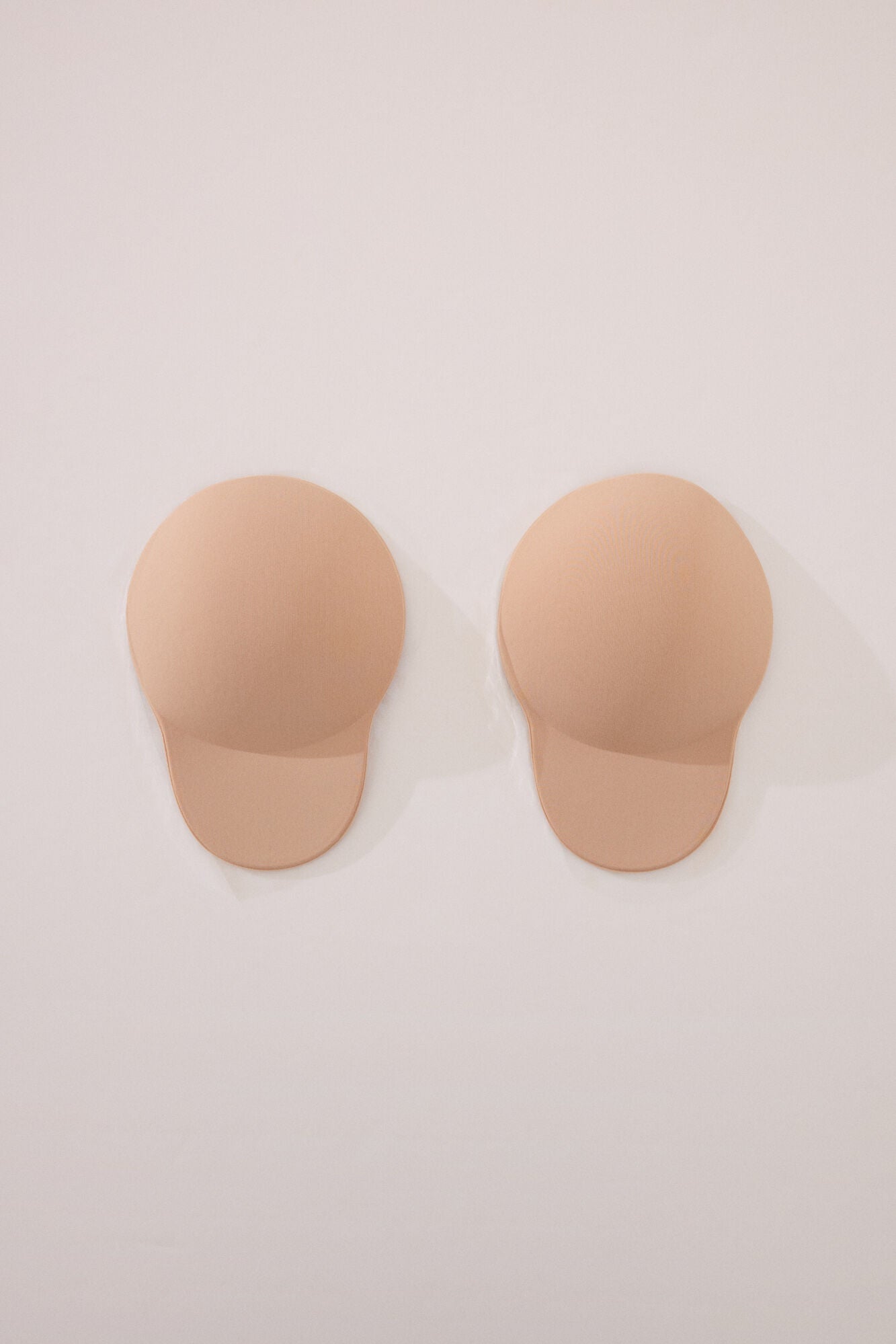 Nude-colored foam adhesive cups