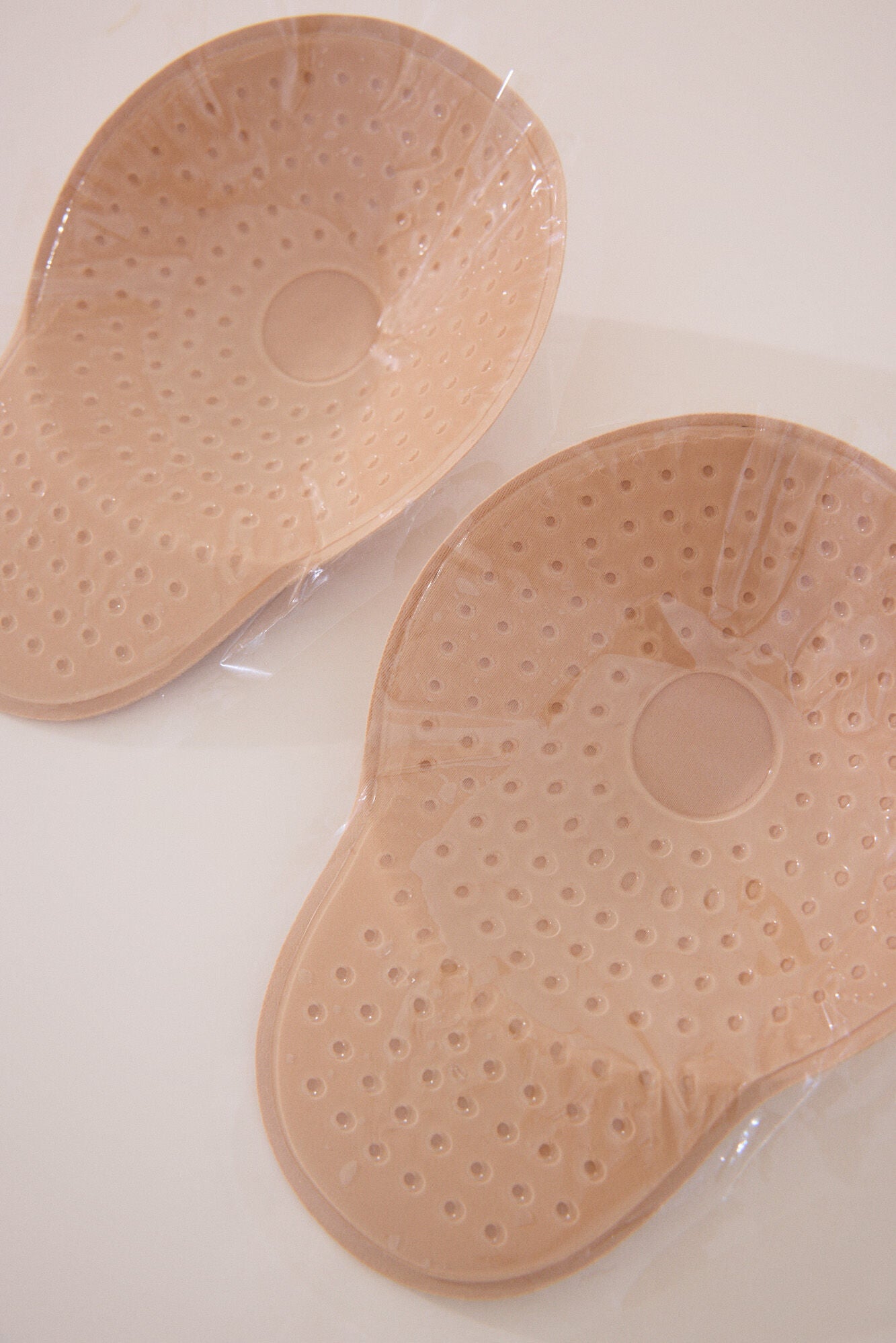 Nude-colored foam adhesive cups