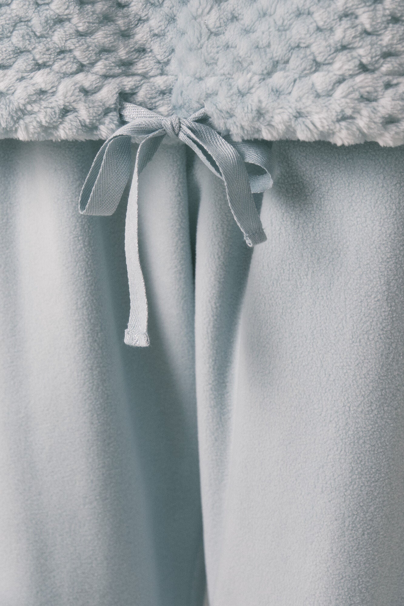 Long green fleece pajamas with border