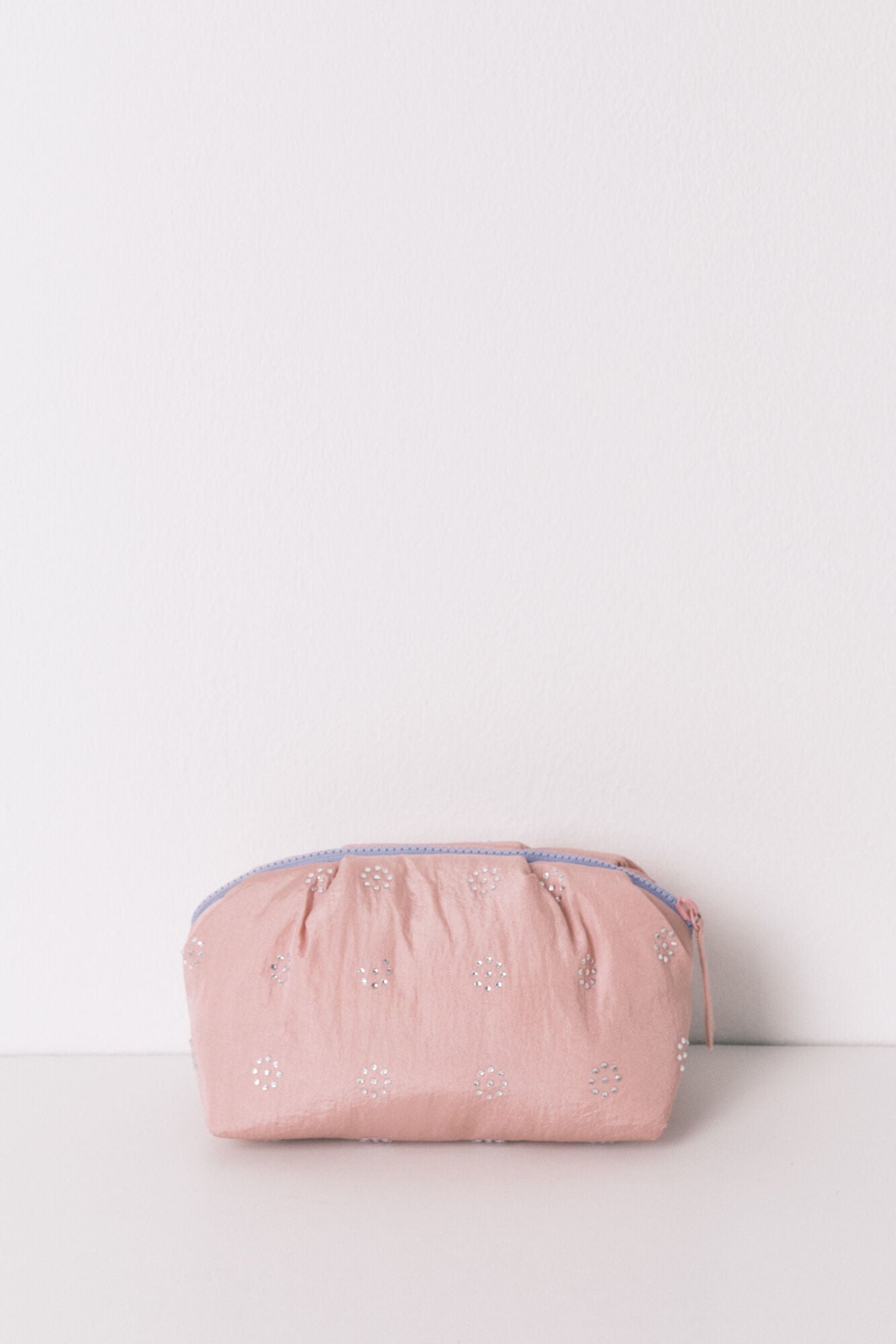 Medium padded pink sequined toiletry bag