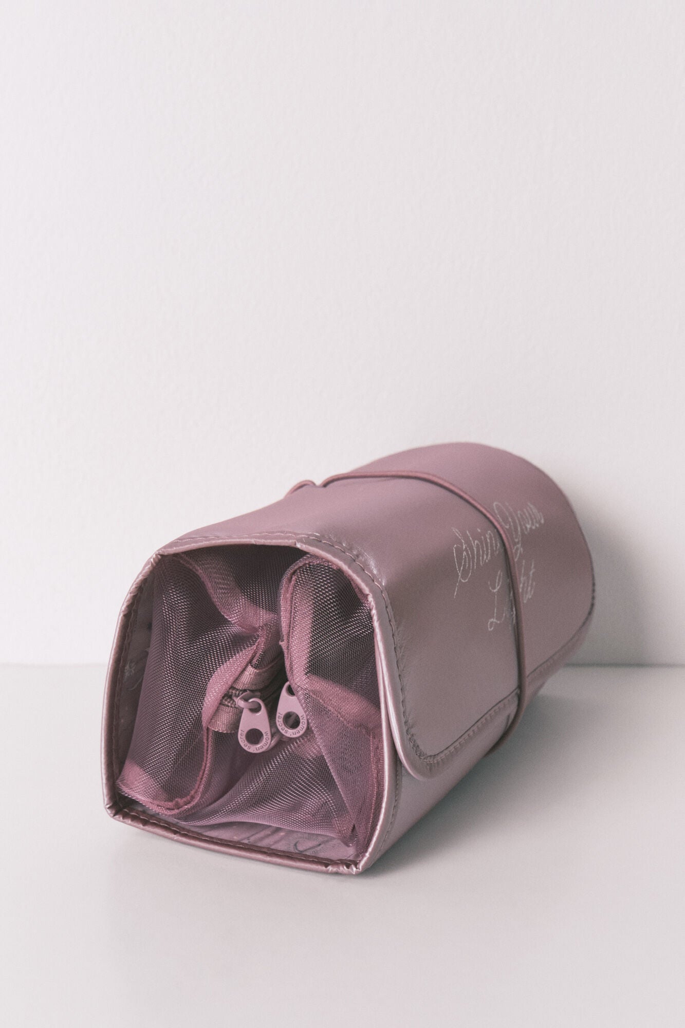 Medium pink satin toiletry bag with hanger