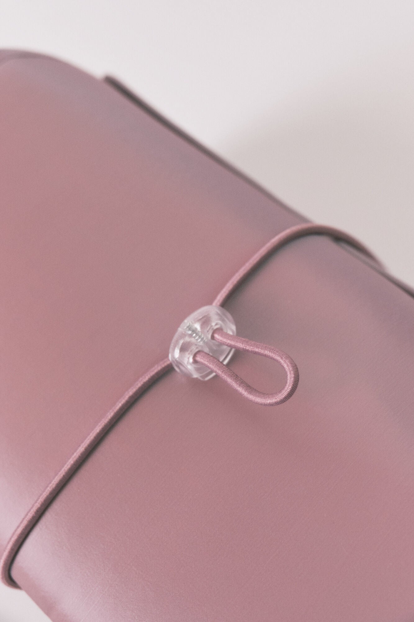 Medium pink satin toiletry bag with hanger