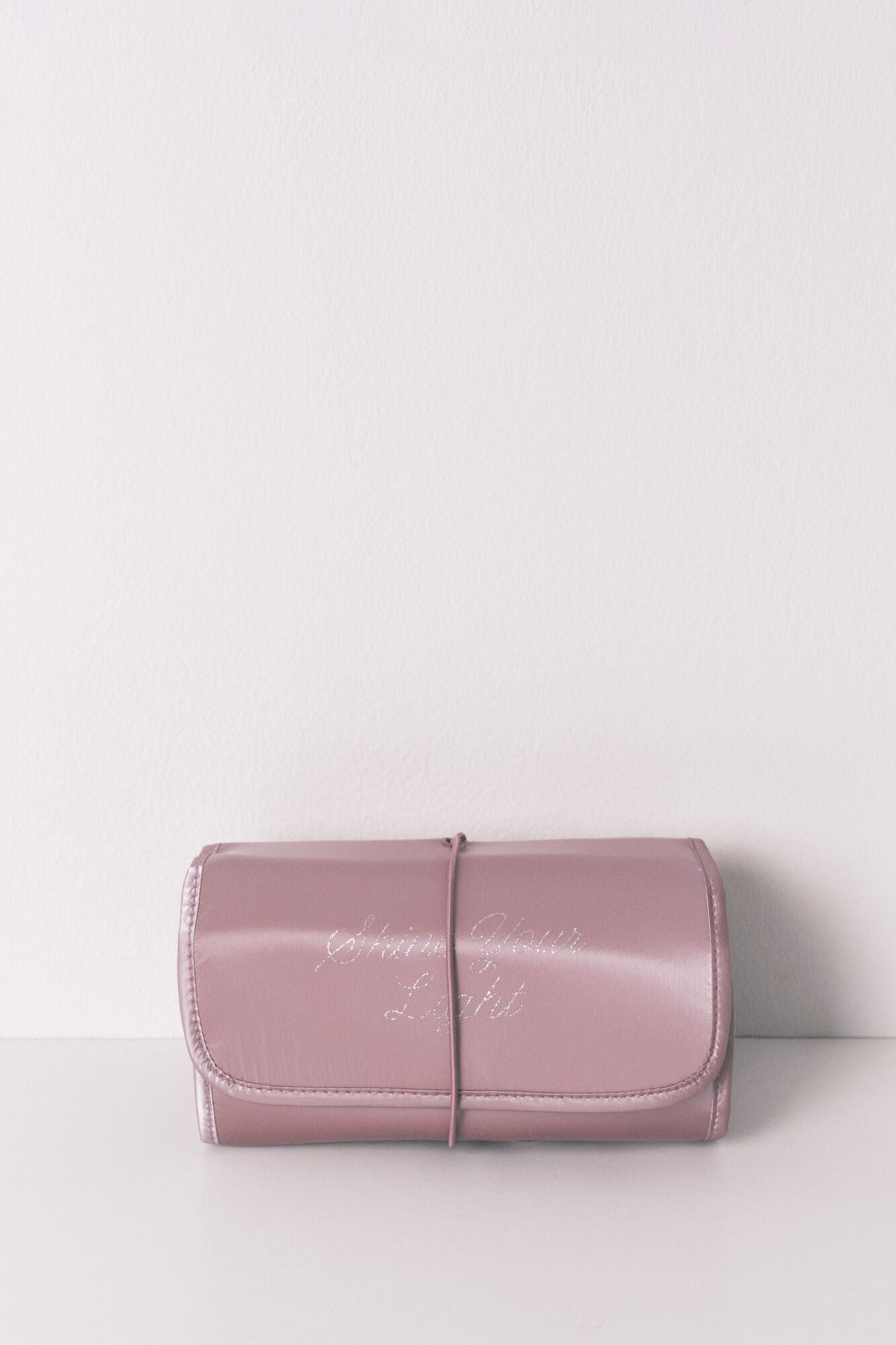 Medium pink satin toiletry bag with hanger
