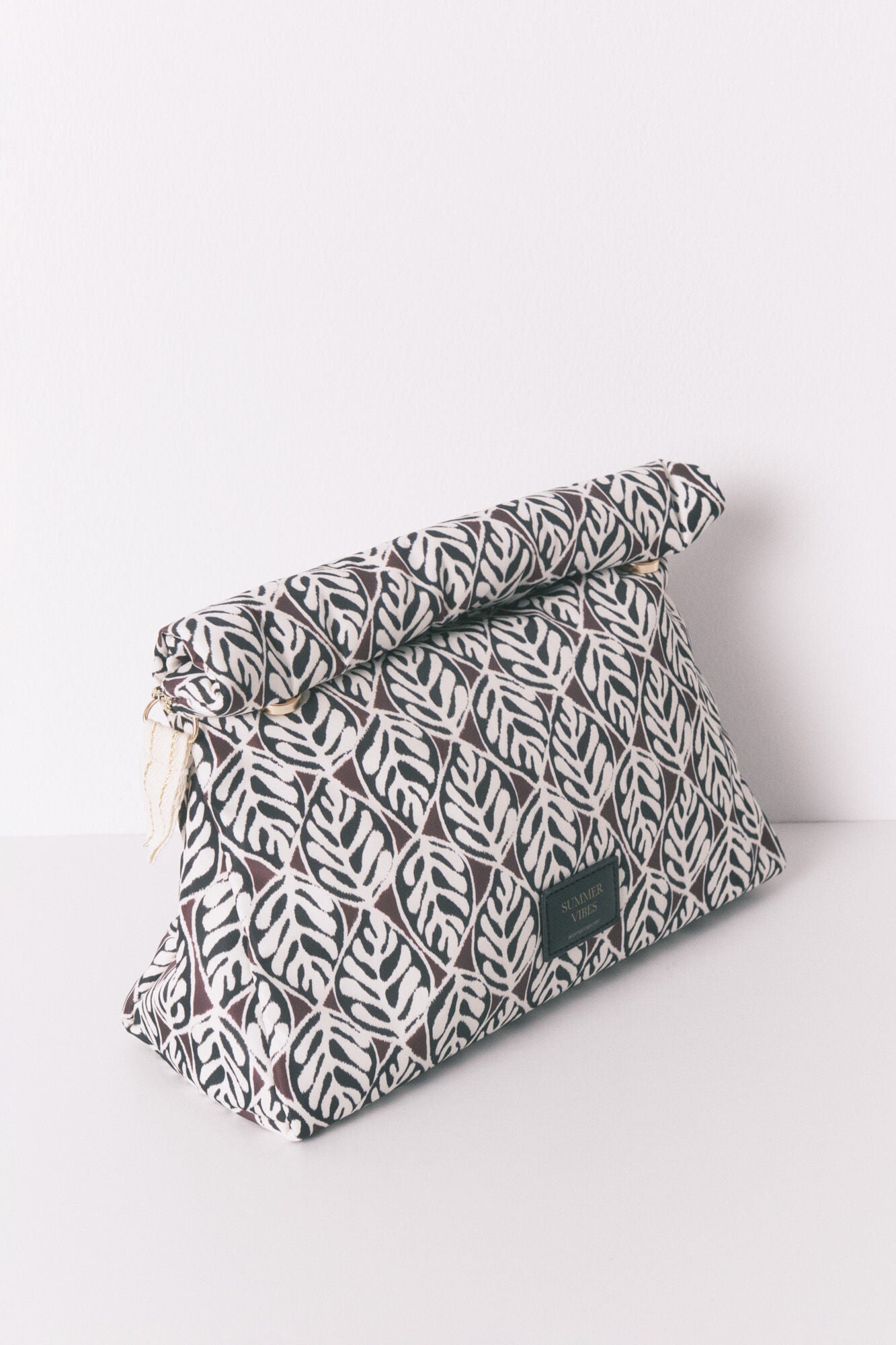 Large quilted toiletry vanity case with leaf print