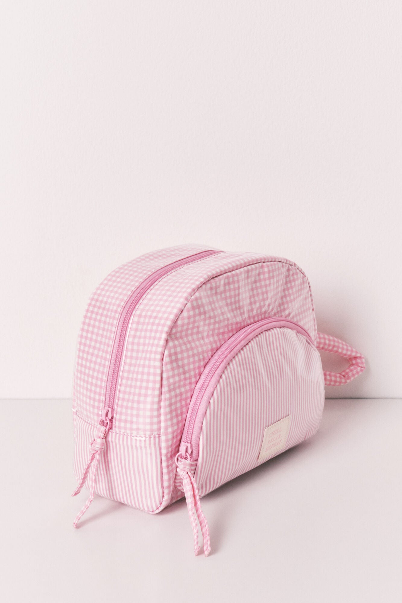 Pink puffer checked and striped vanity case