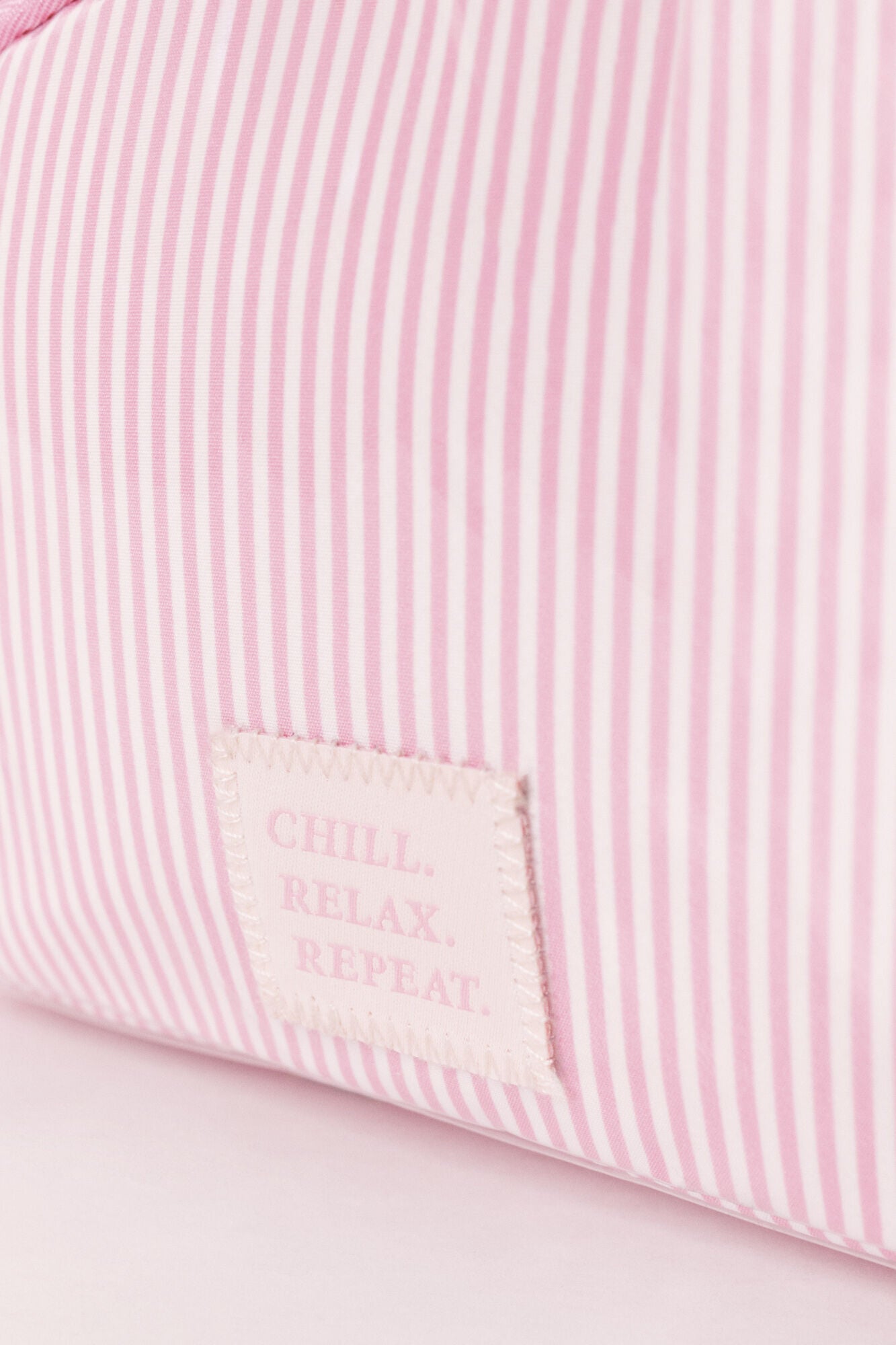 Pink puffer checked and striped vanity case