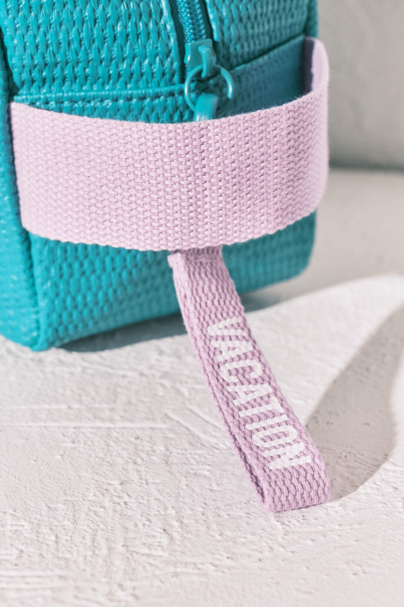 Raffia toiletry bag