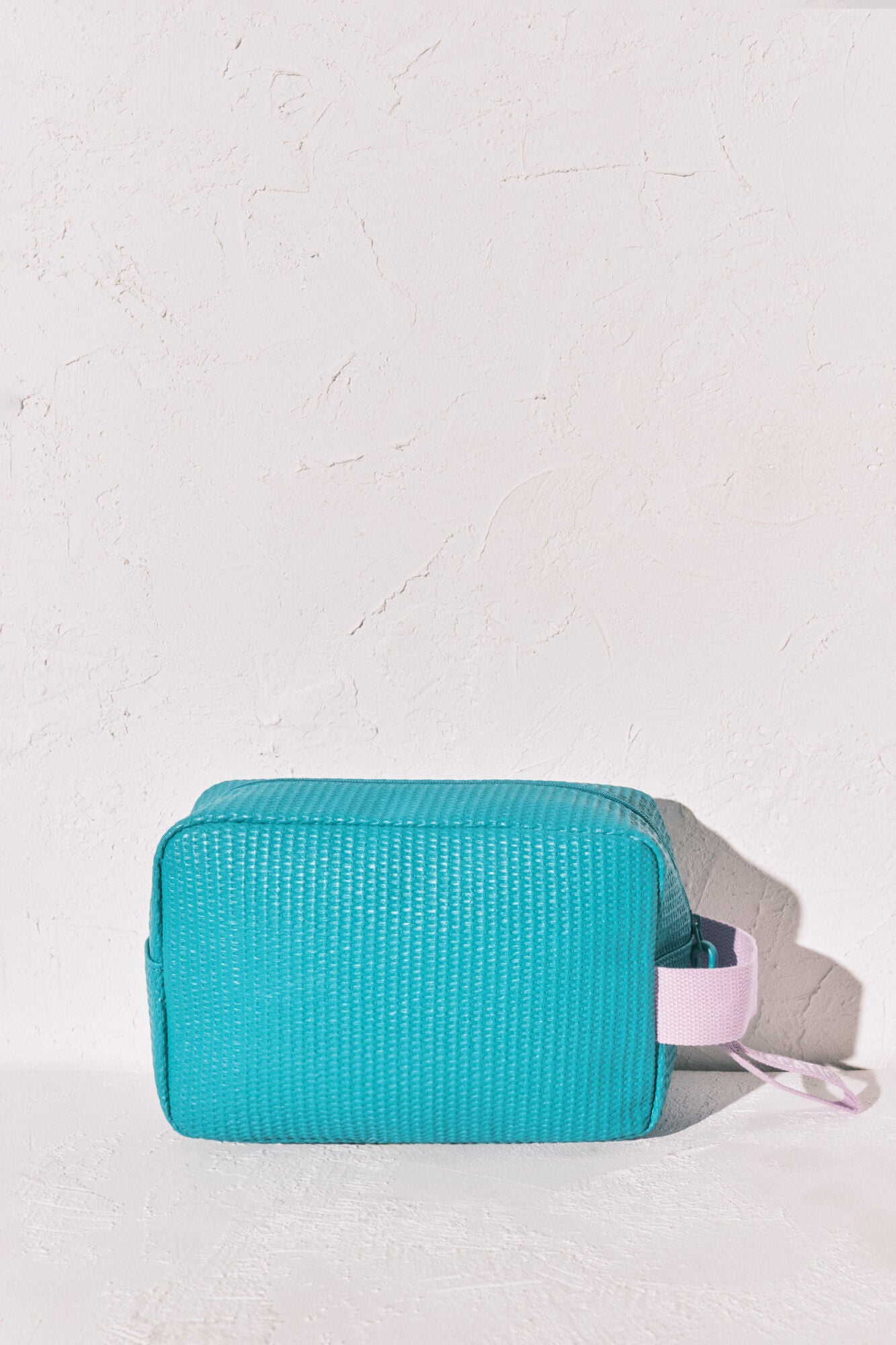 Raffia toiletry bag