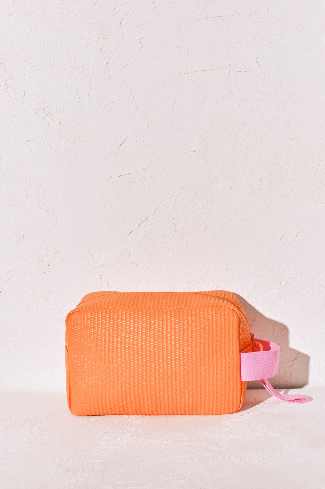 Raffia toiletry bag