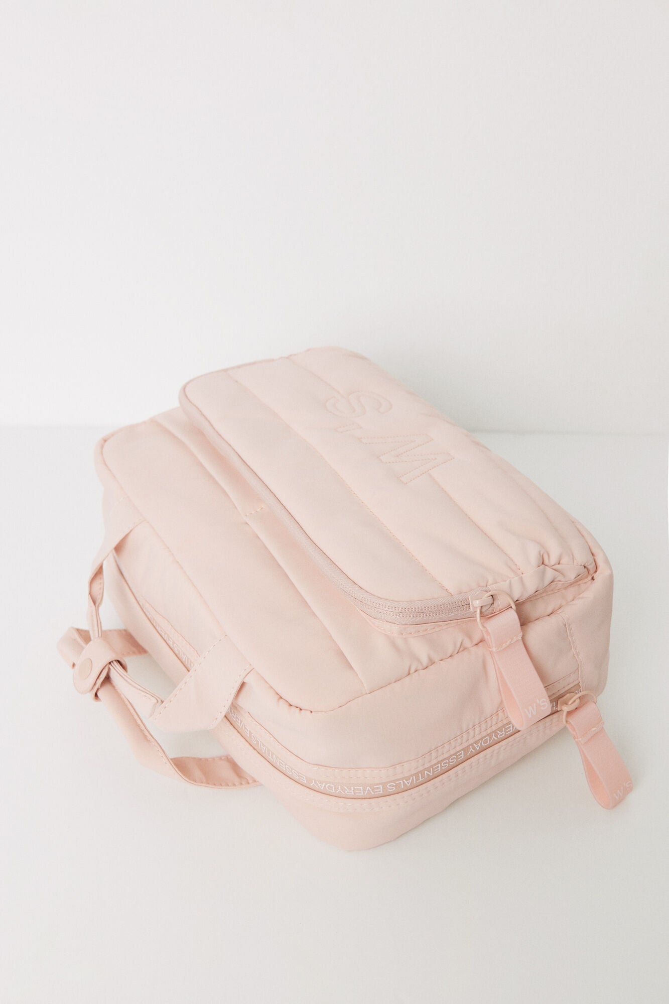 Large pink quilted toiletry bag