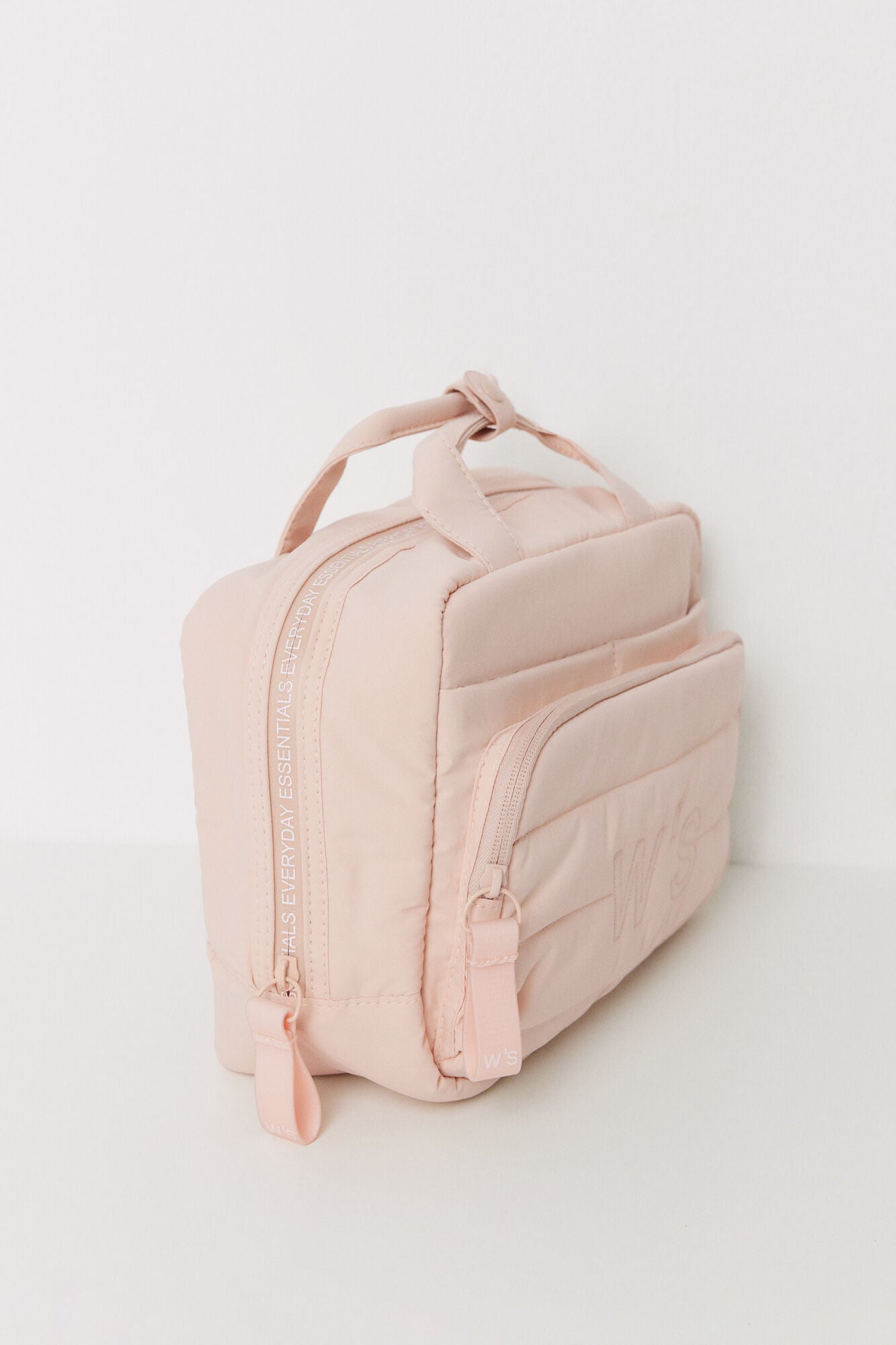 Large pink quilted toiletry bag