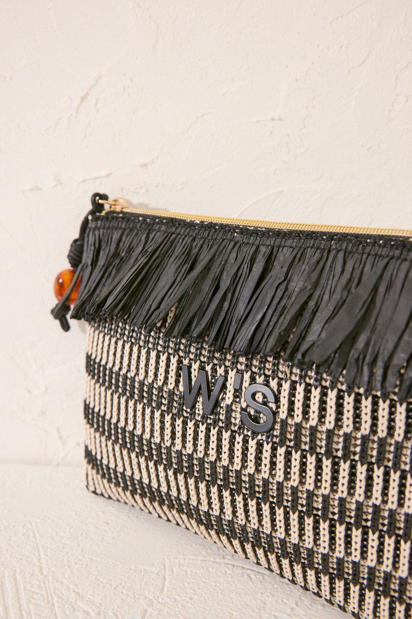 Black and white raffia toiletry bag