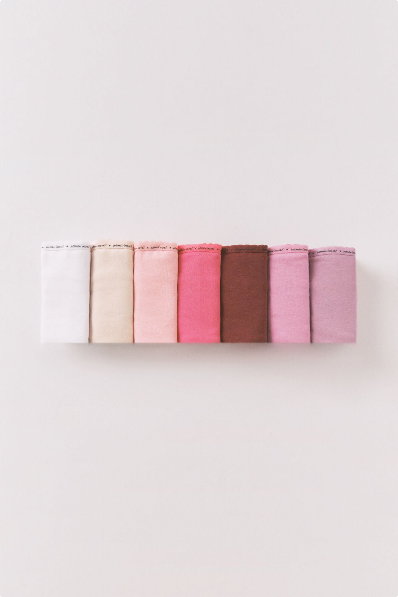 Pink cotton 7-pack thongs