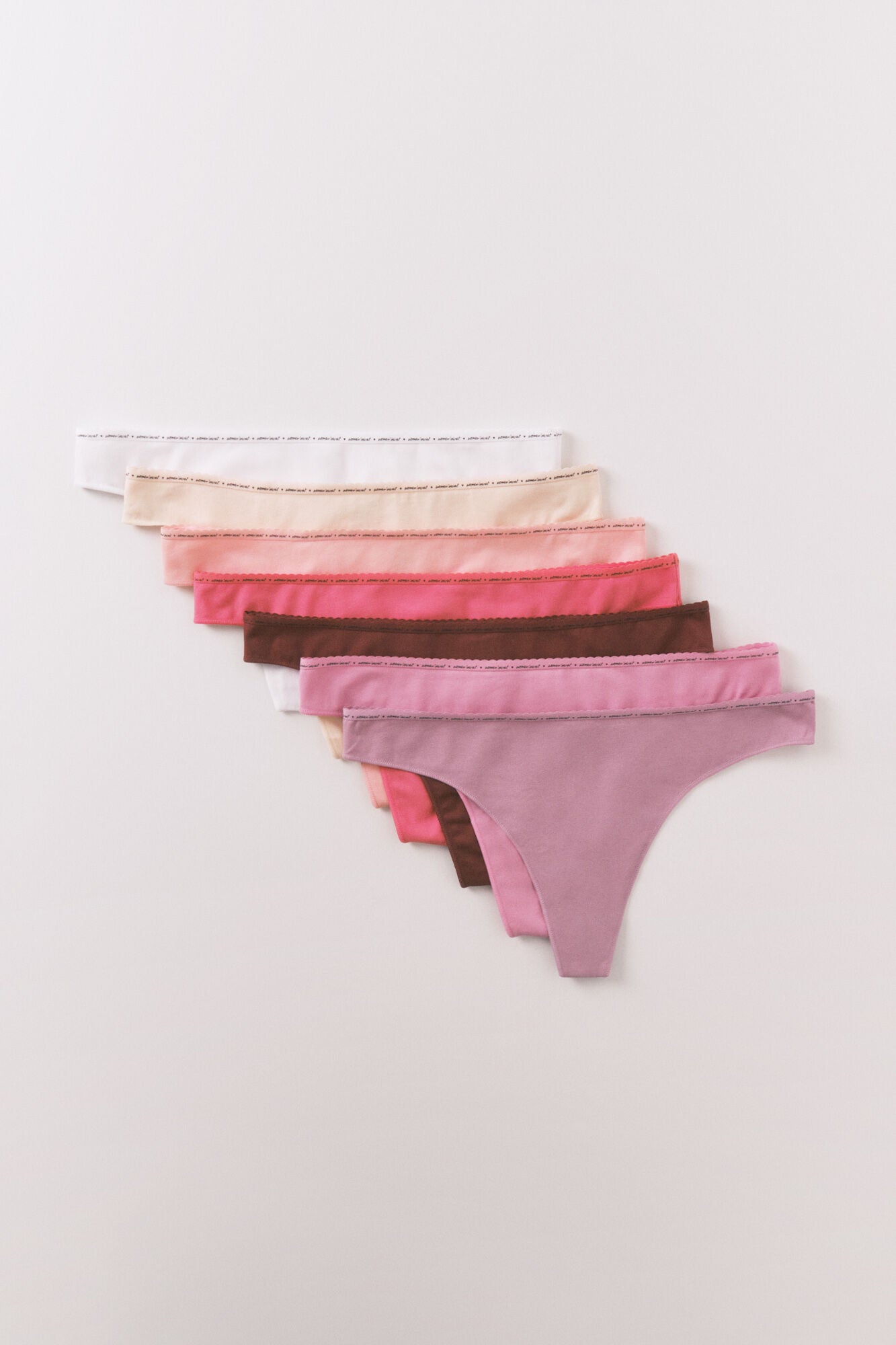 Pink cotton 7-pack thongs