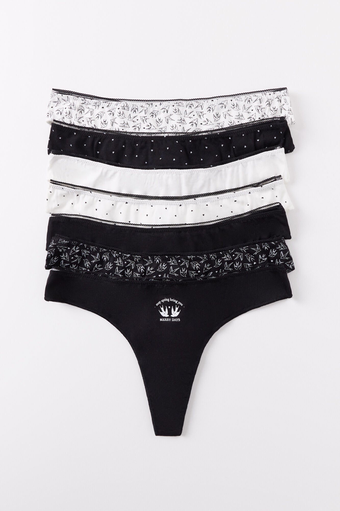 Pack of 7 plain and printed cotton thongs B&W