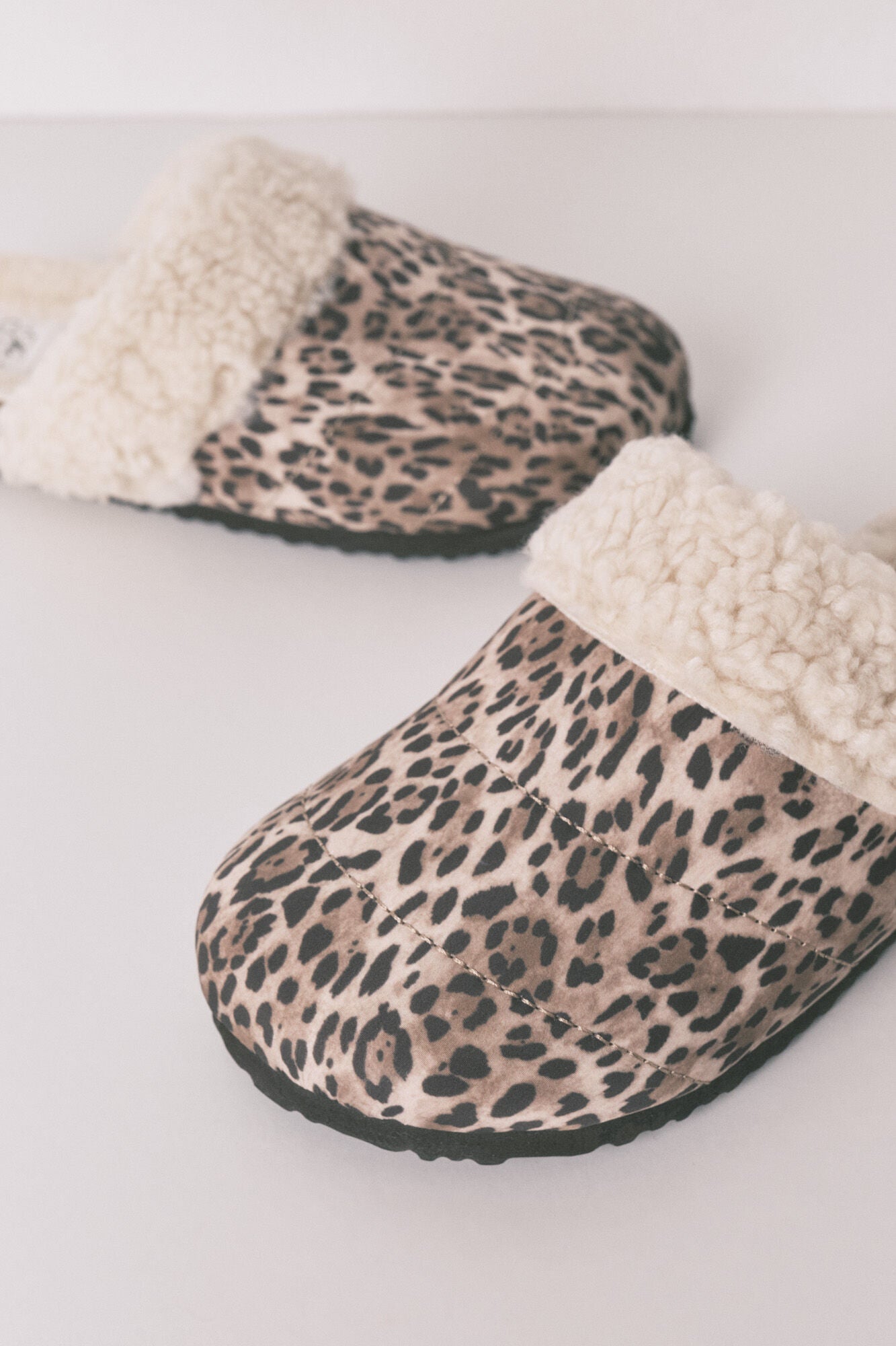 Animal print sheepskin clog-style sneakers