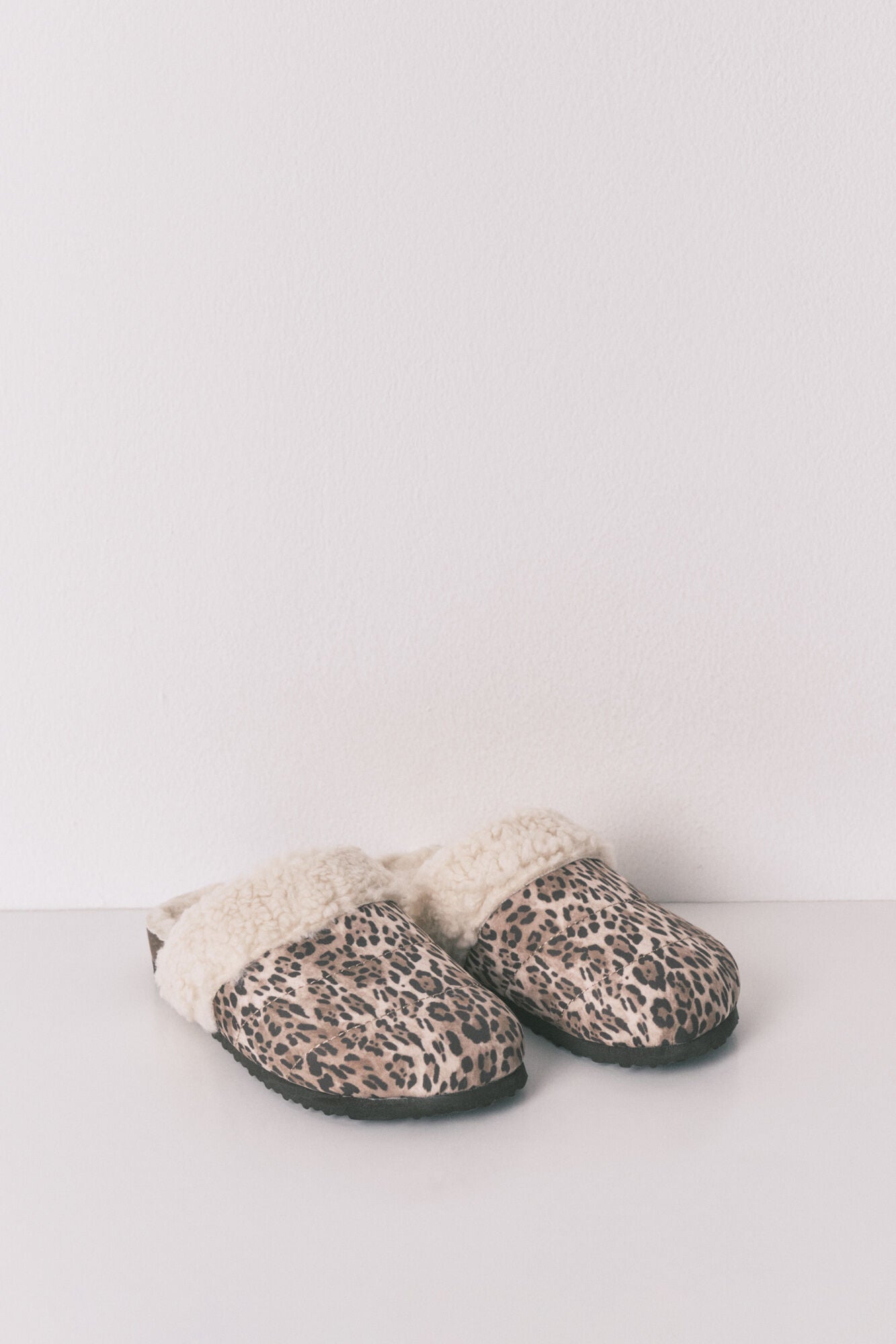 Animal print sheepskin clog-style sneakers