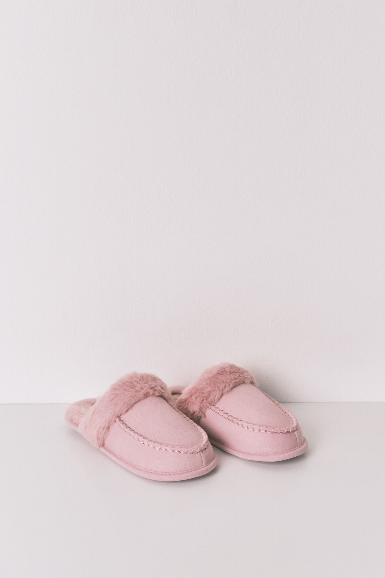 Pink synthetic fur house slippers