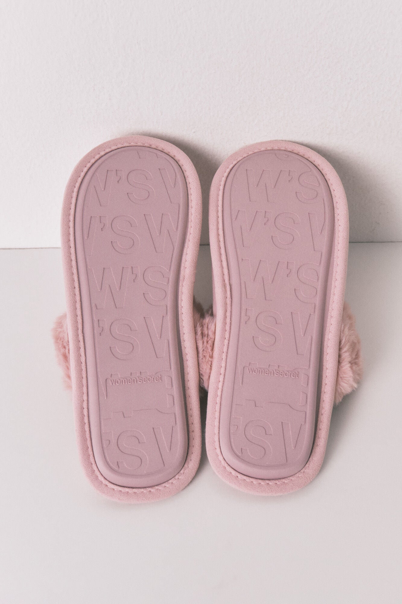Pink synthetic fur house slippers