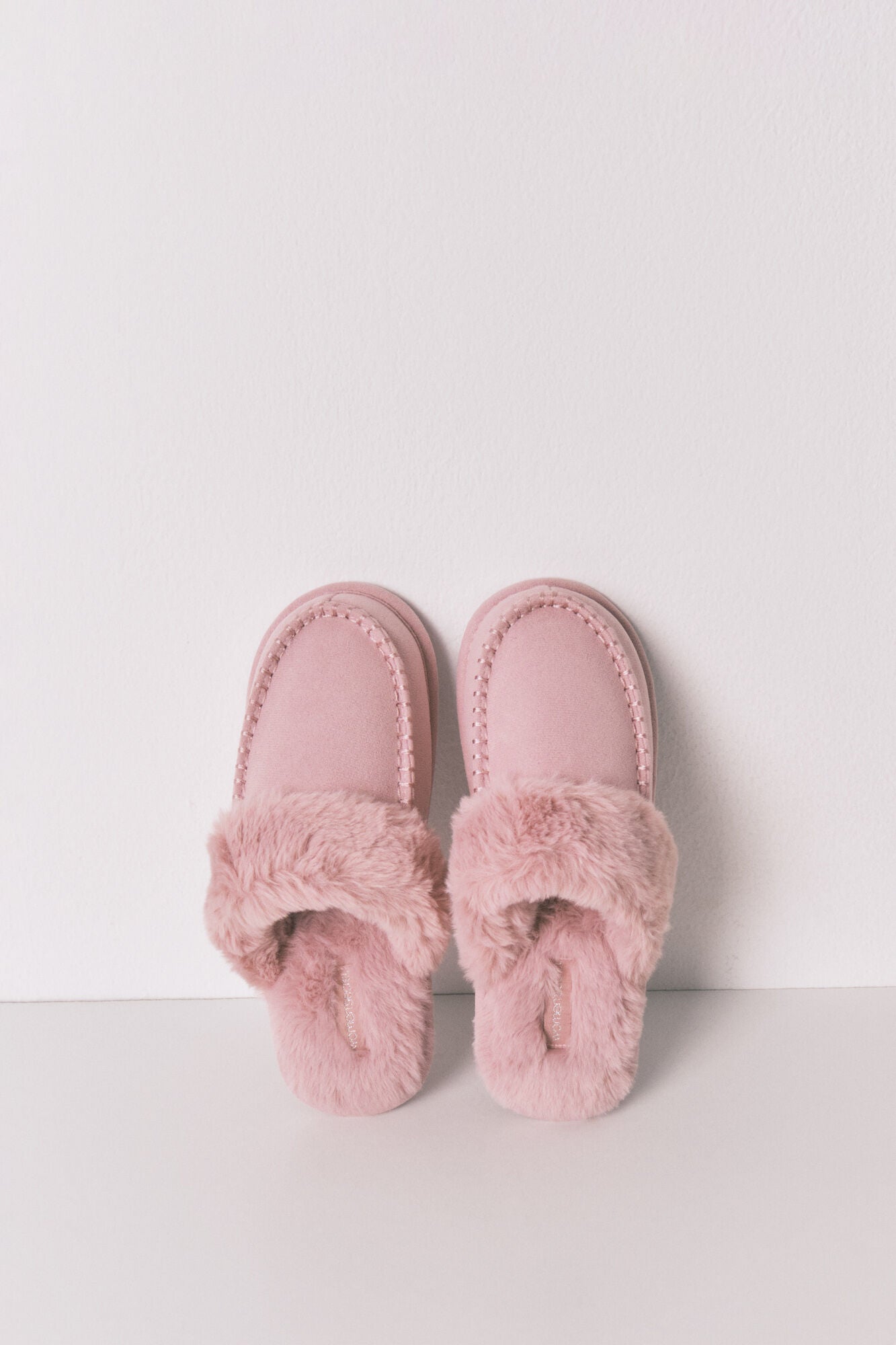 Pink synthetic fur house slippers
