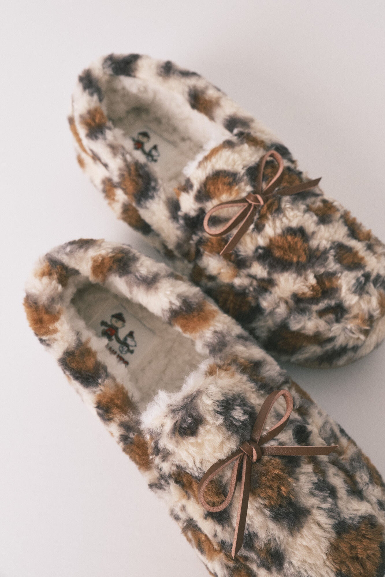 Animal print faux shearling slippers