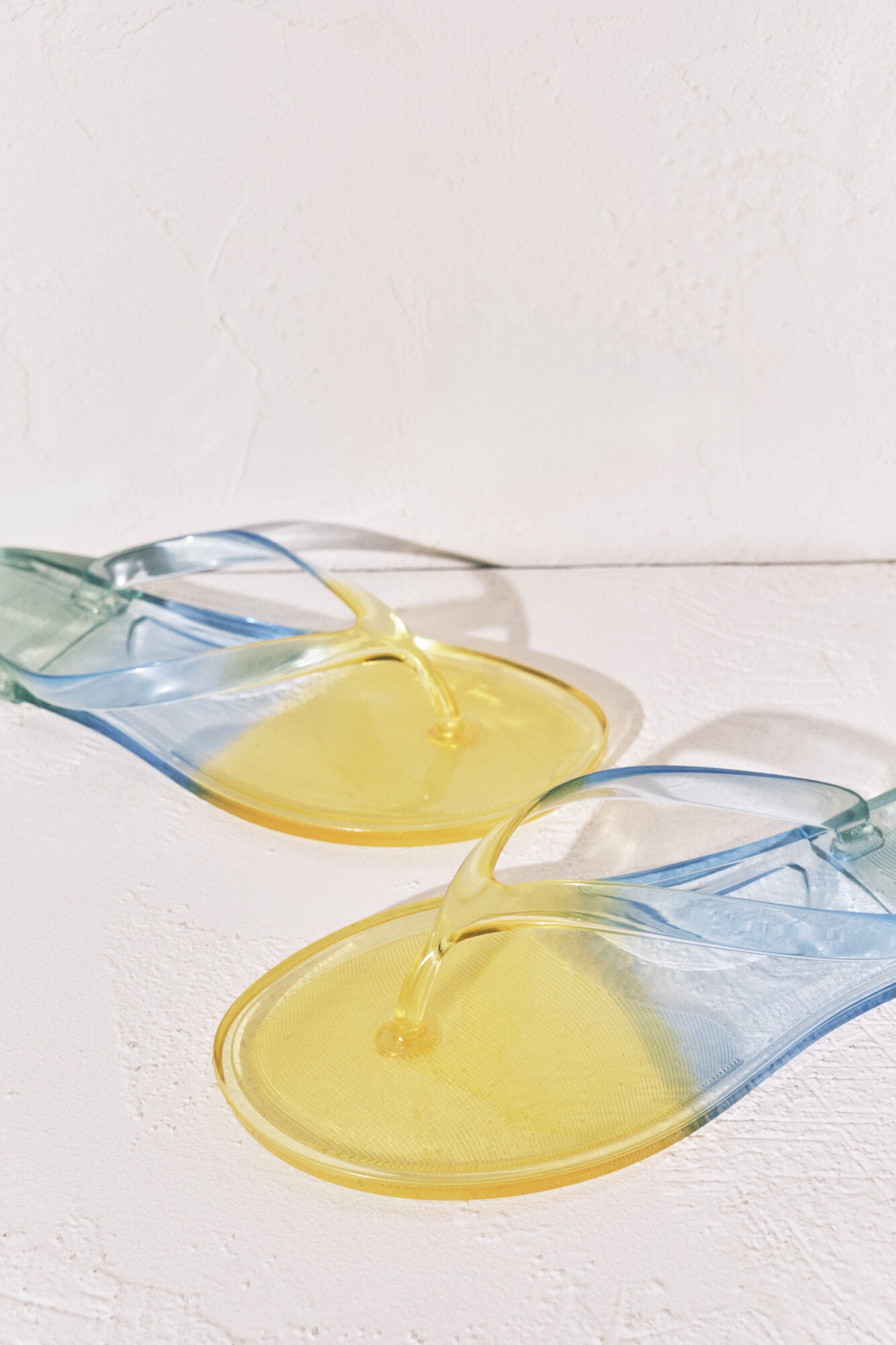 Transparent green flip-flops