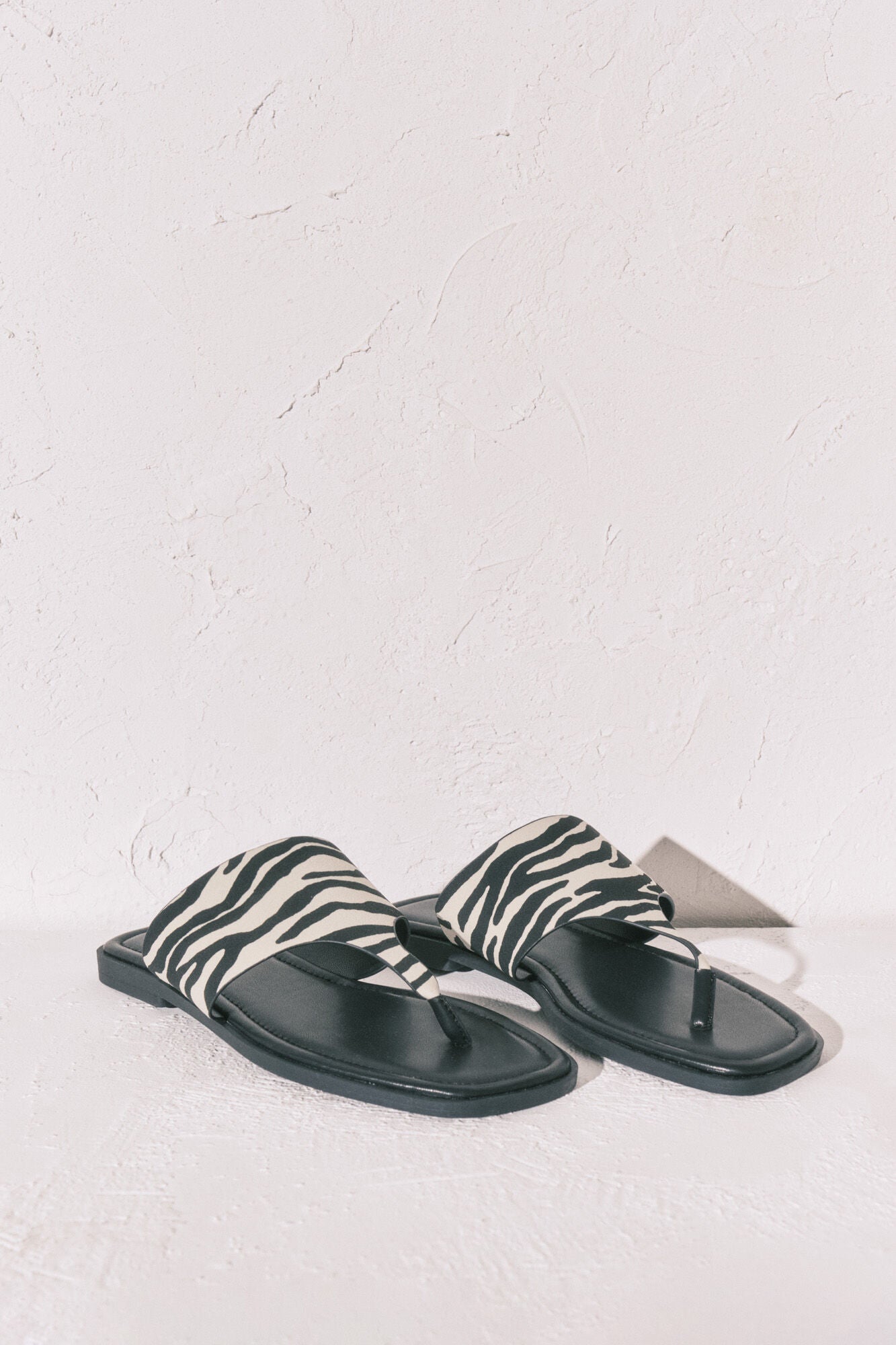 Zebra print flat toe sandals