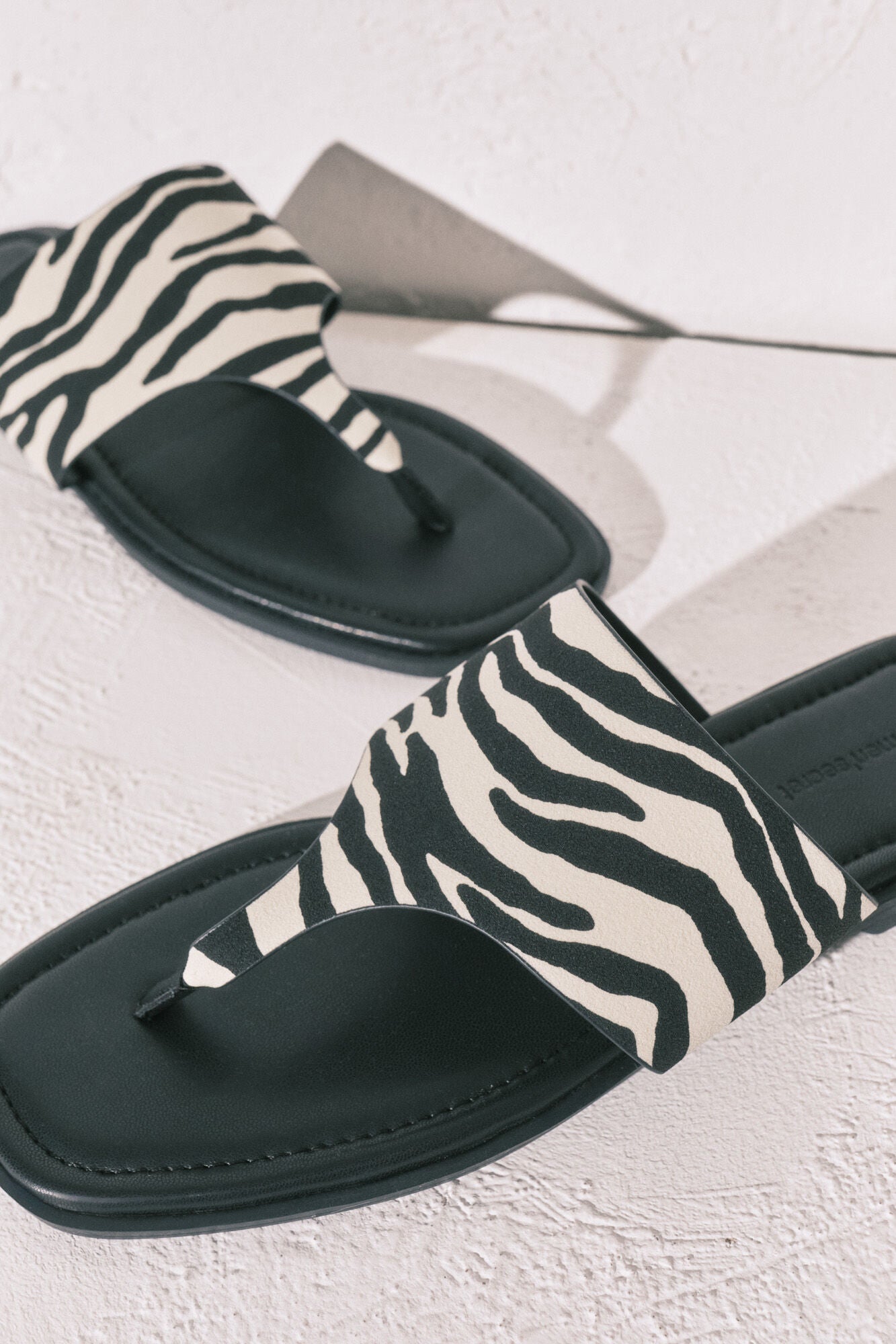 Zebra print flat toe sandals