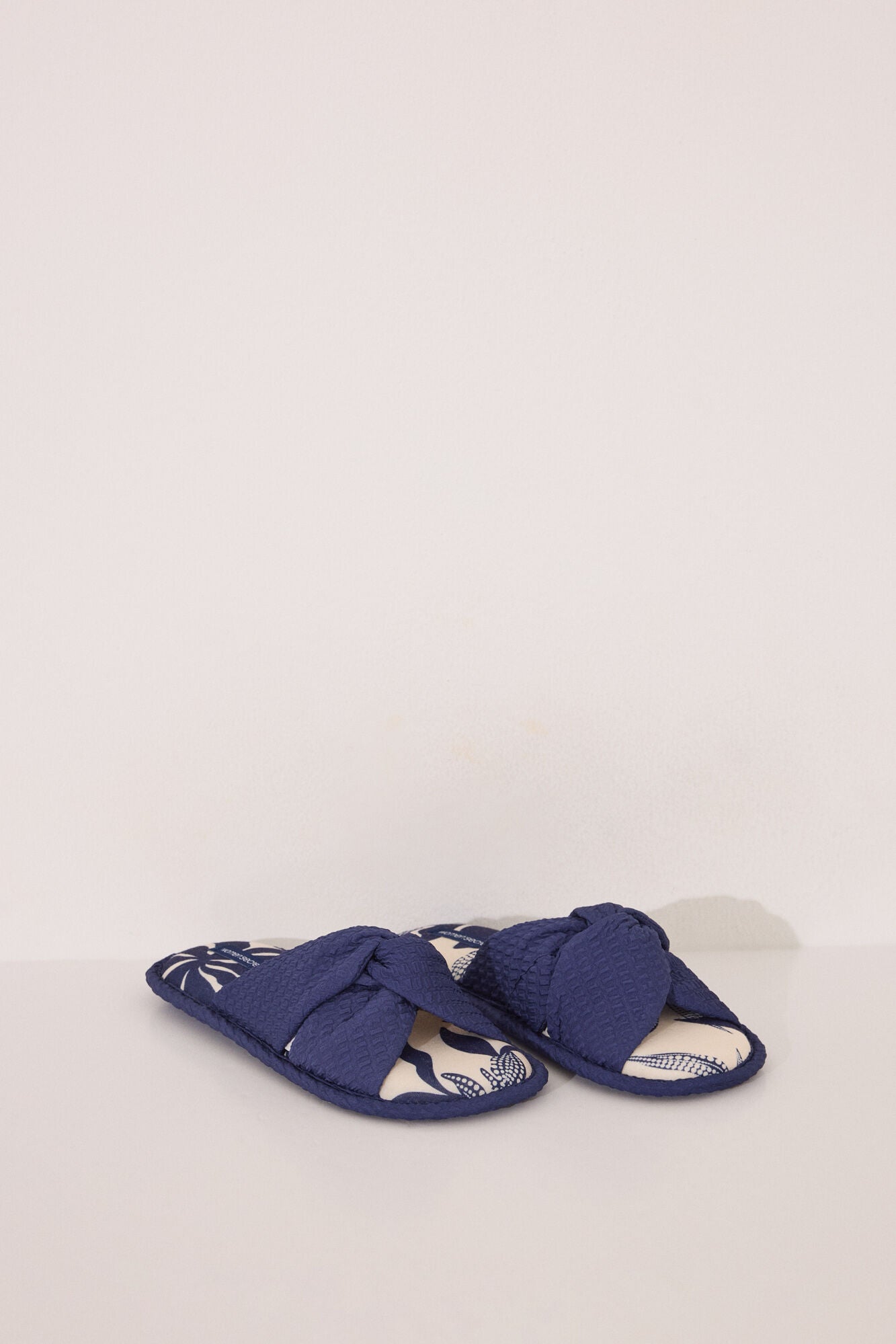 Slippers with blue flower print