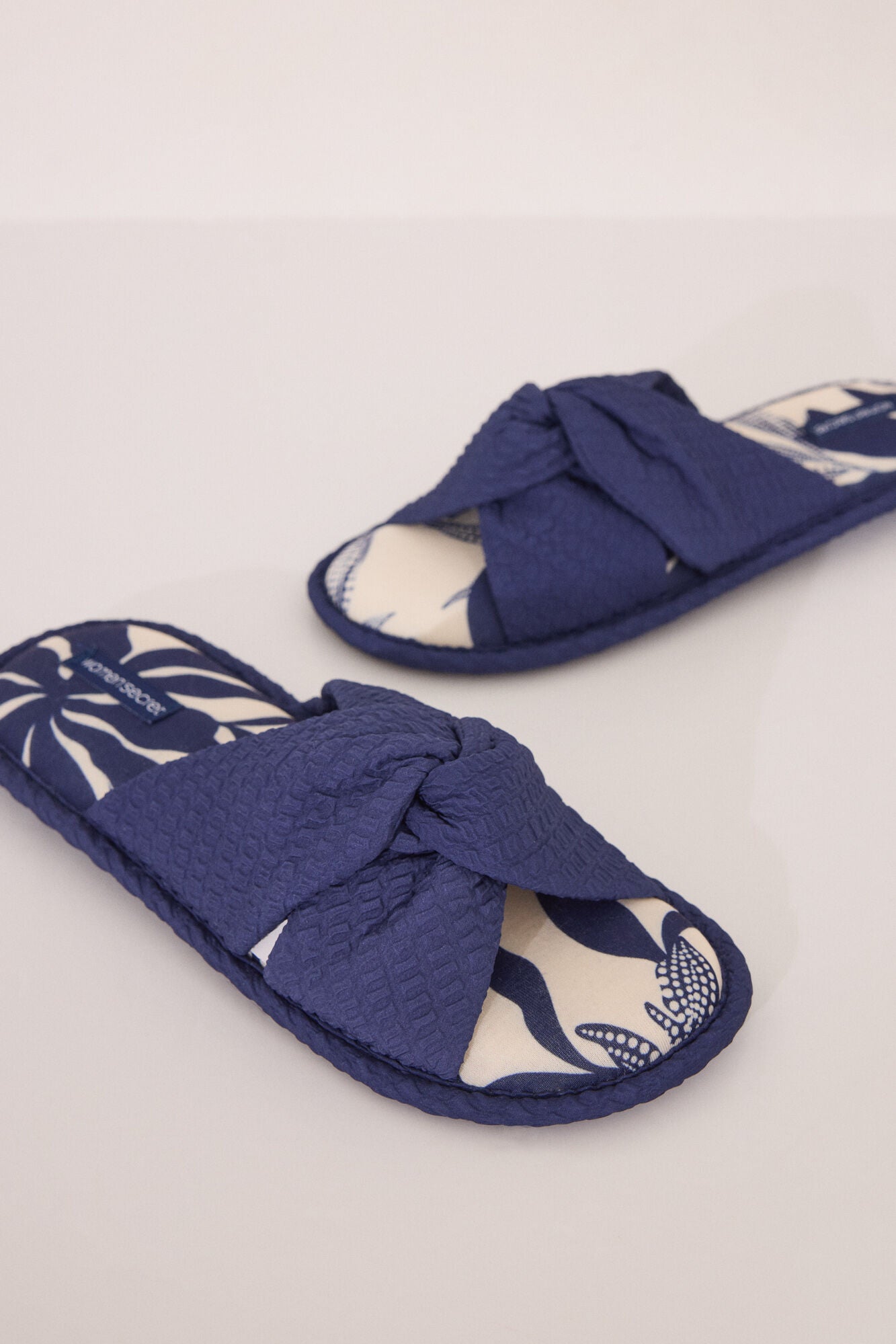 Slippers with blue flower print