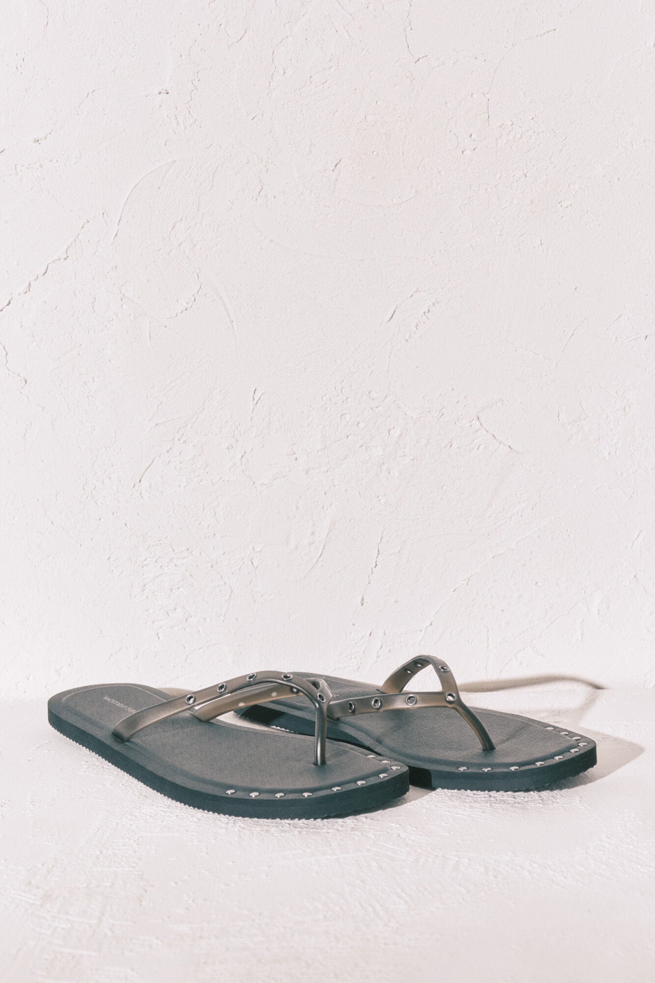 Black square-toe flip-flops with studs
