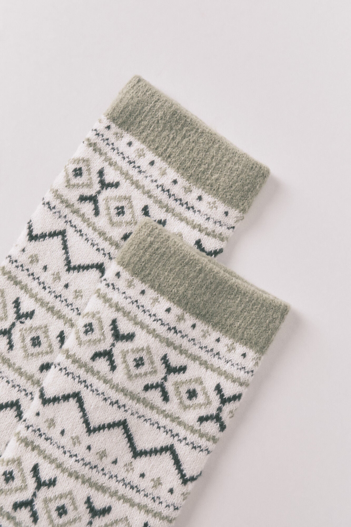 Long fur socks with green border print